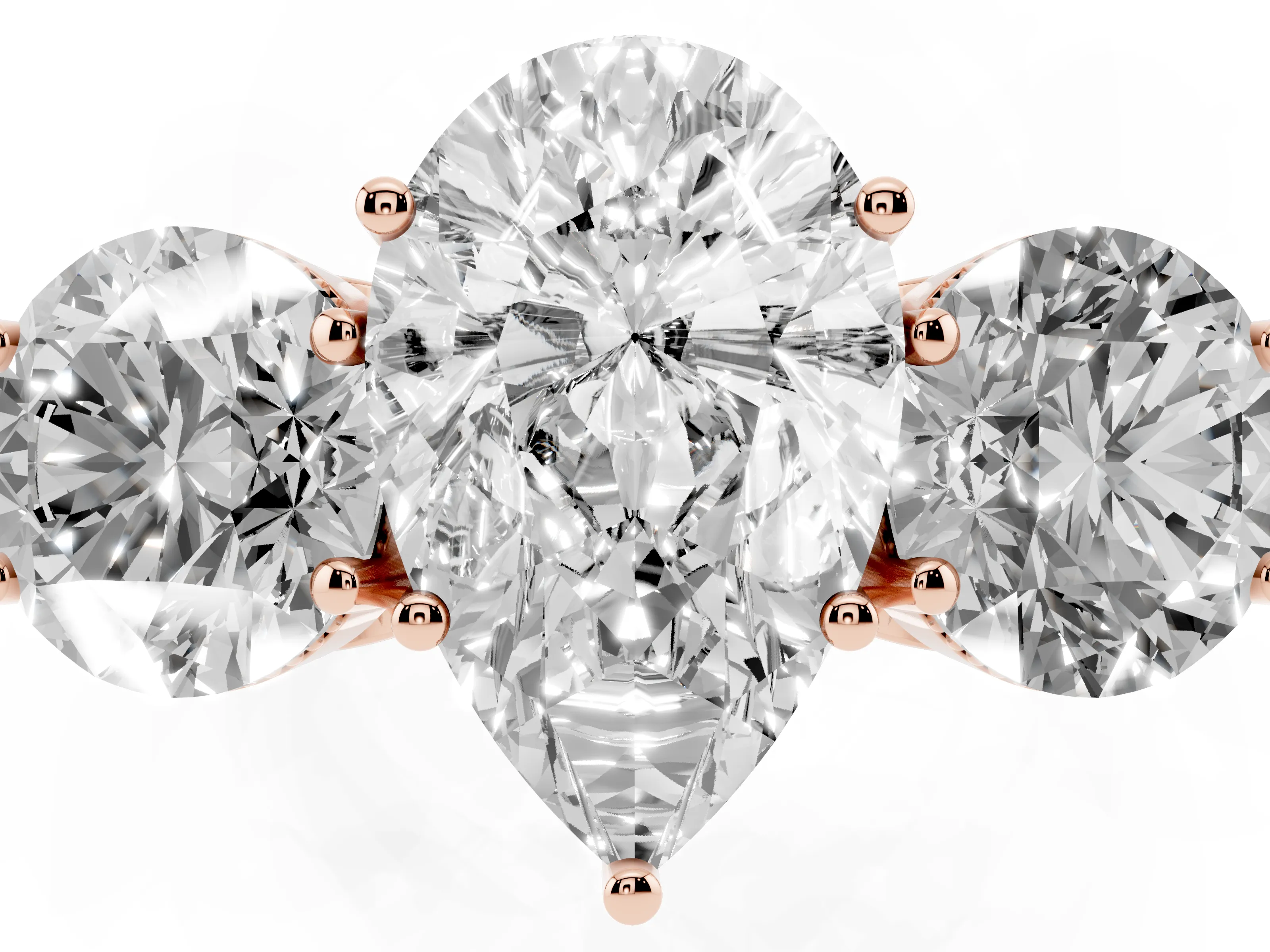 Pear Cut Diamond Three-Stone Engagement Ring Set in Rose gold with Polished Band