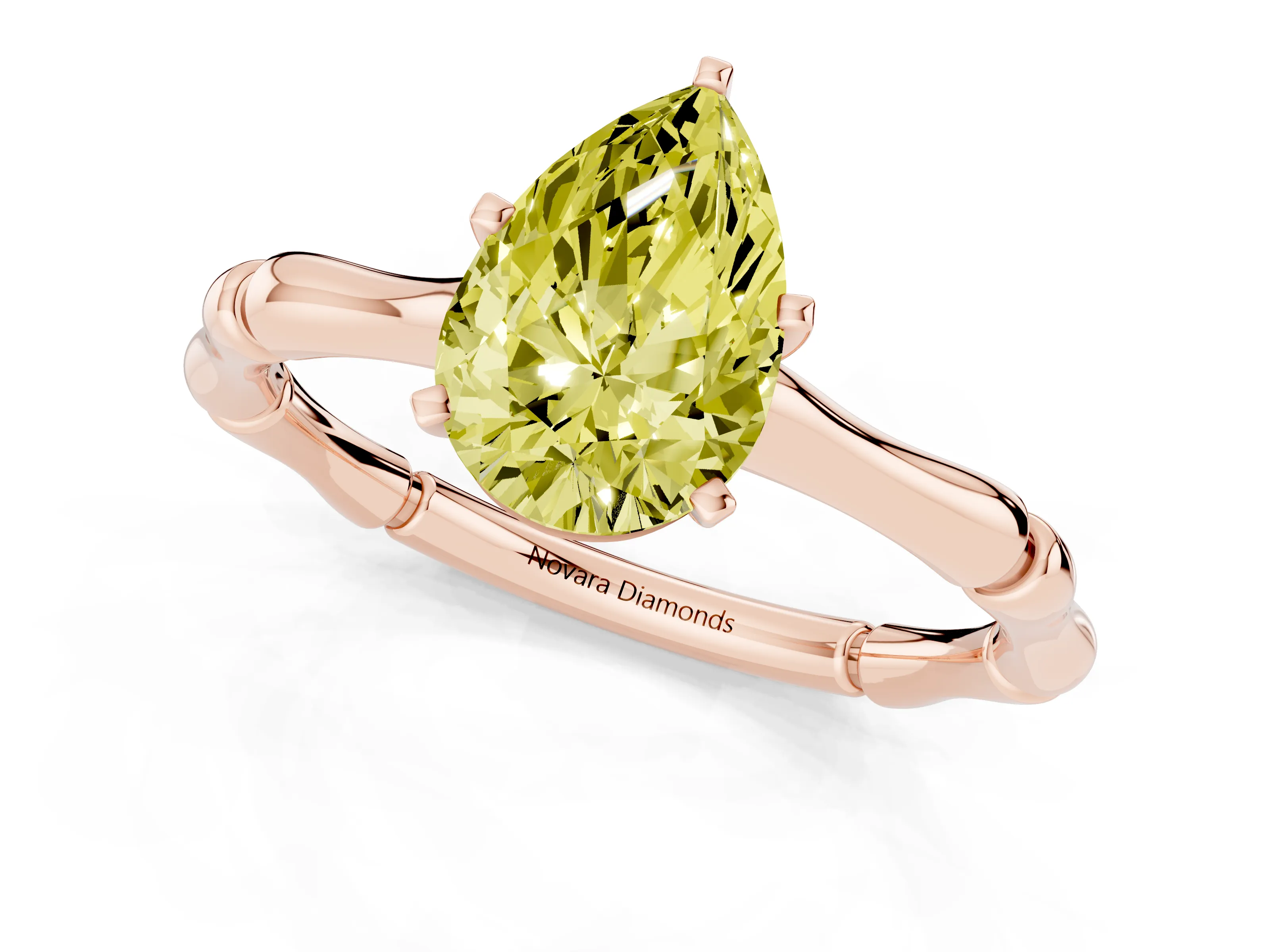 Fancy Yellow Pear Cut Diamond Solitaire Ring Set in Rose gold with Bamboo Band and Prong Setting