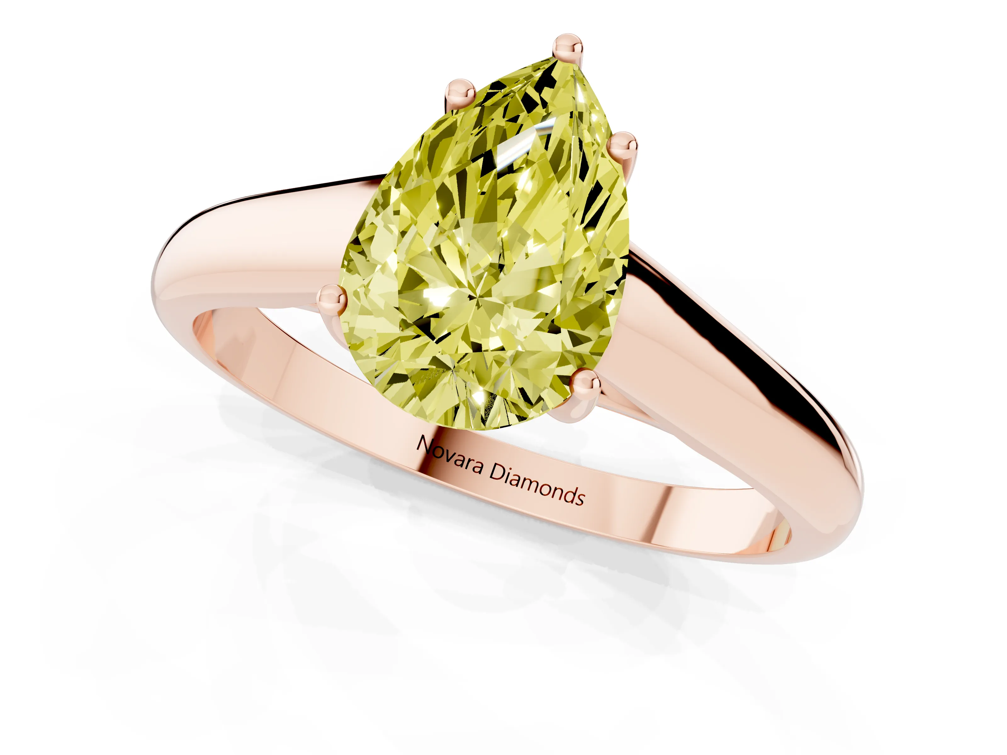 Fancy Yellow Pear Cut Diamond Solitaire Engagement Ring Set in Rose gold with Subtly Tapered Band and Prong Setting