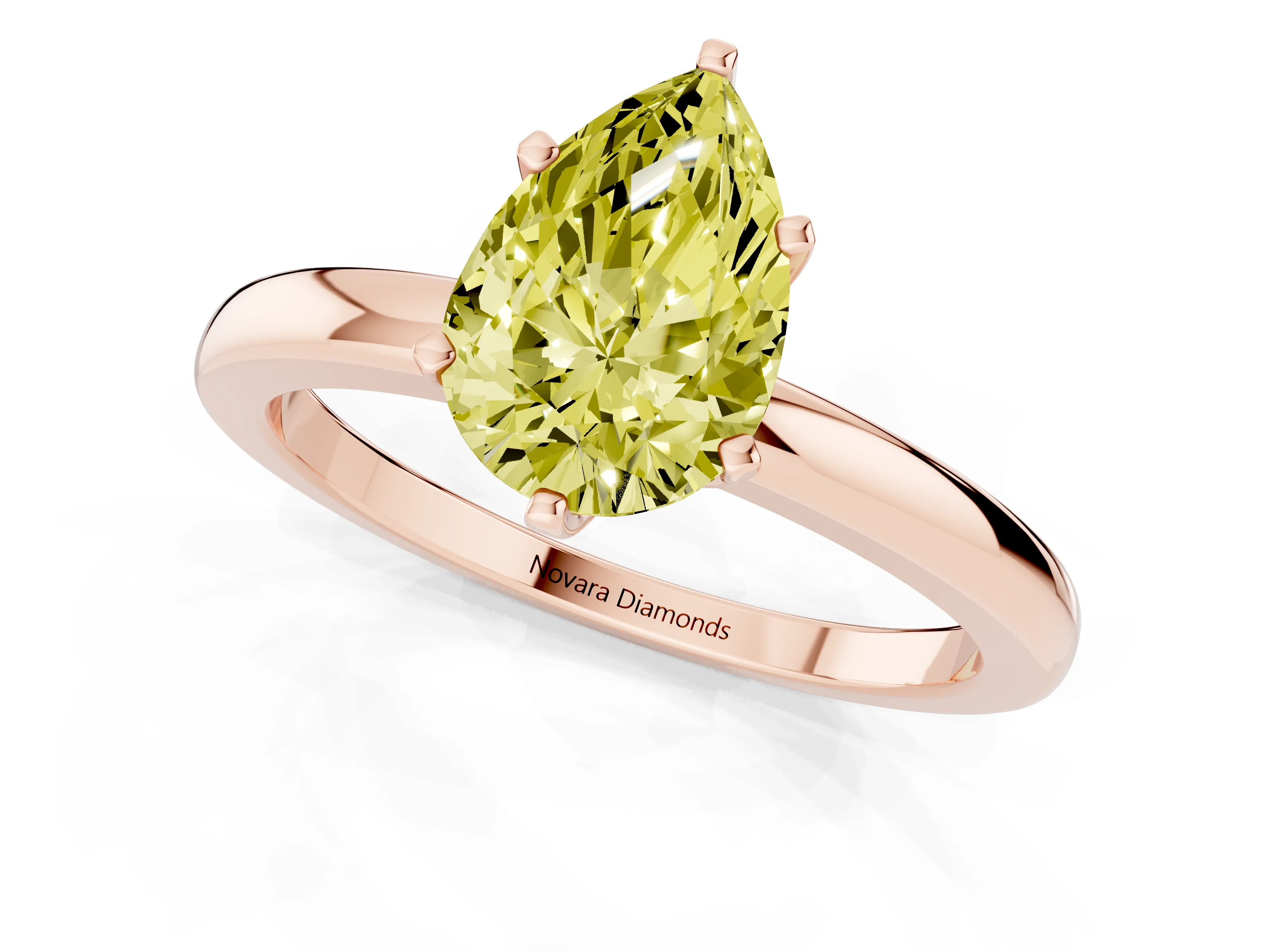 Fancy Yellow Pear Cut Diamond Solitaire Ring Set in Rose gold with Raised Prong Setting on a Classic Band