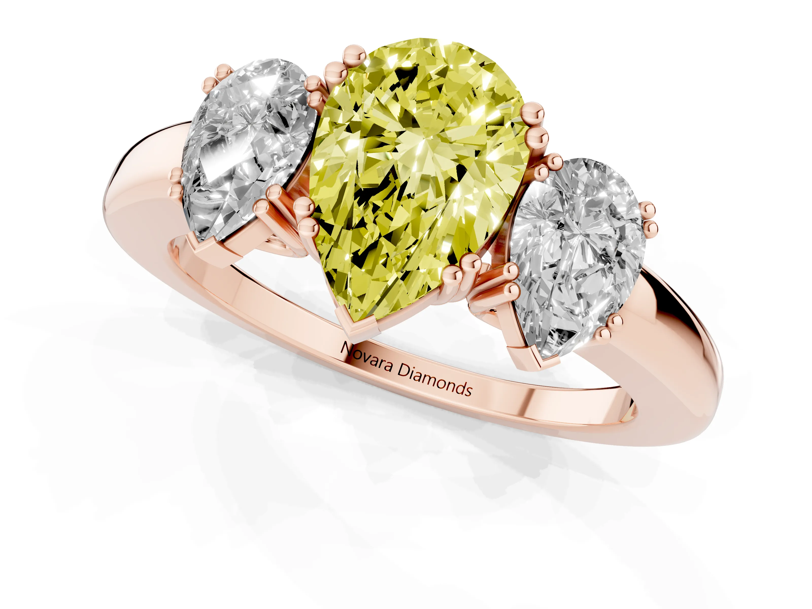 Fancy Yellow Pear Cut Diamond Three-Stone Ring Set in Rose gold with Polished Channel-Set Band