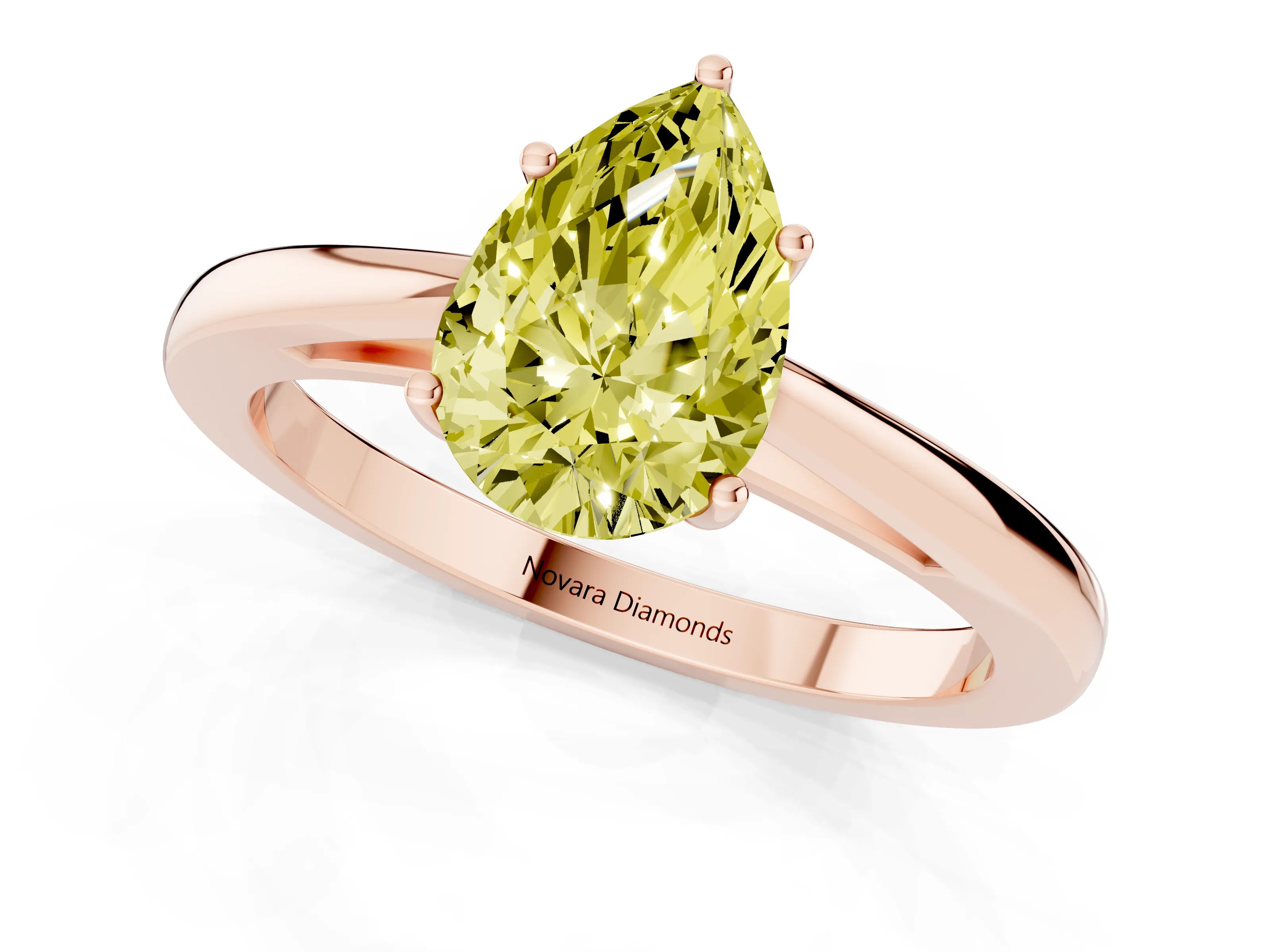 Fancy Yellow Pear Cut Diamond Solitaire Ring Set in Rose gold with Split Shank and Prong Setting