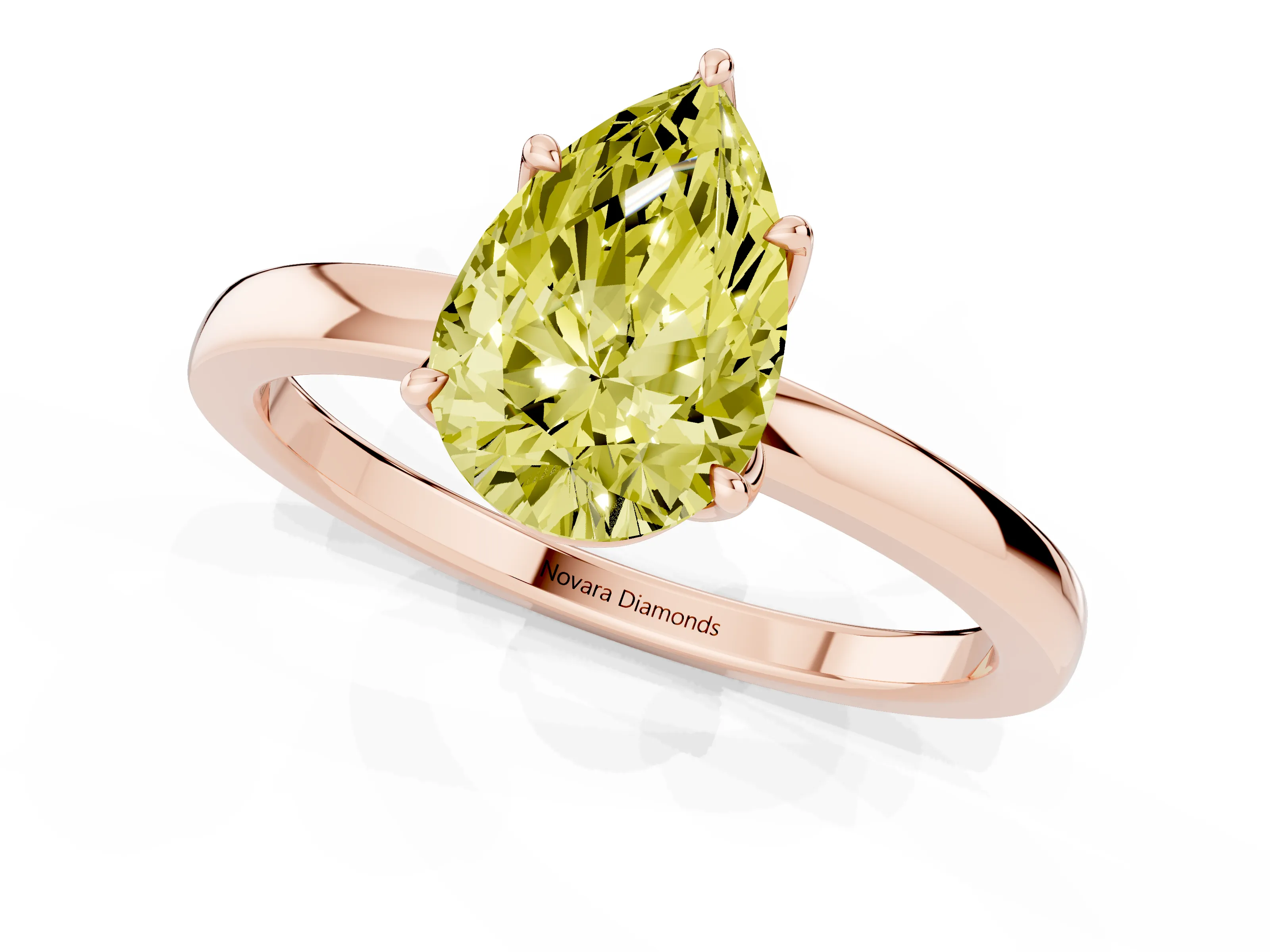 Fancy Yellow Pear Cut Diamond Solitaire Ring Set in Rose gold with Prong Setting and Thin Polished Band