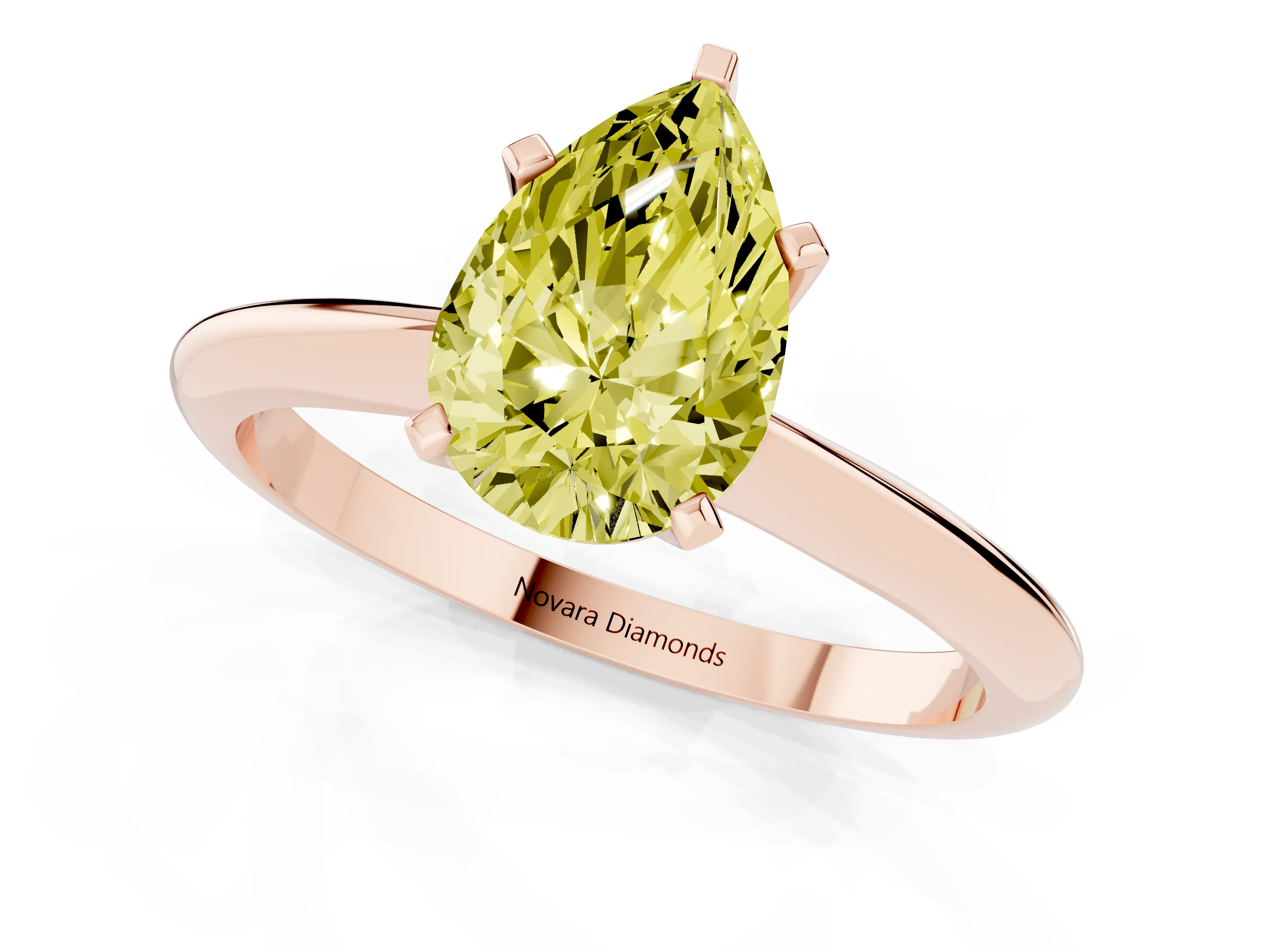 Fancy Yellow Pear Cut Diamond Solitaire Ring Set in Rose gold with Prong Setting on a Plain Round Band