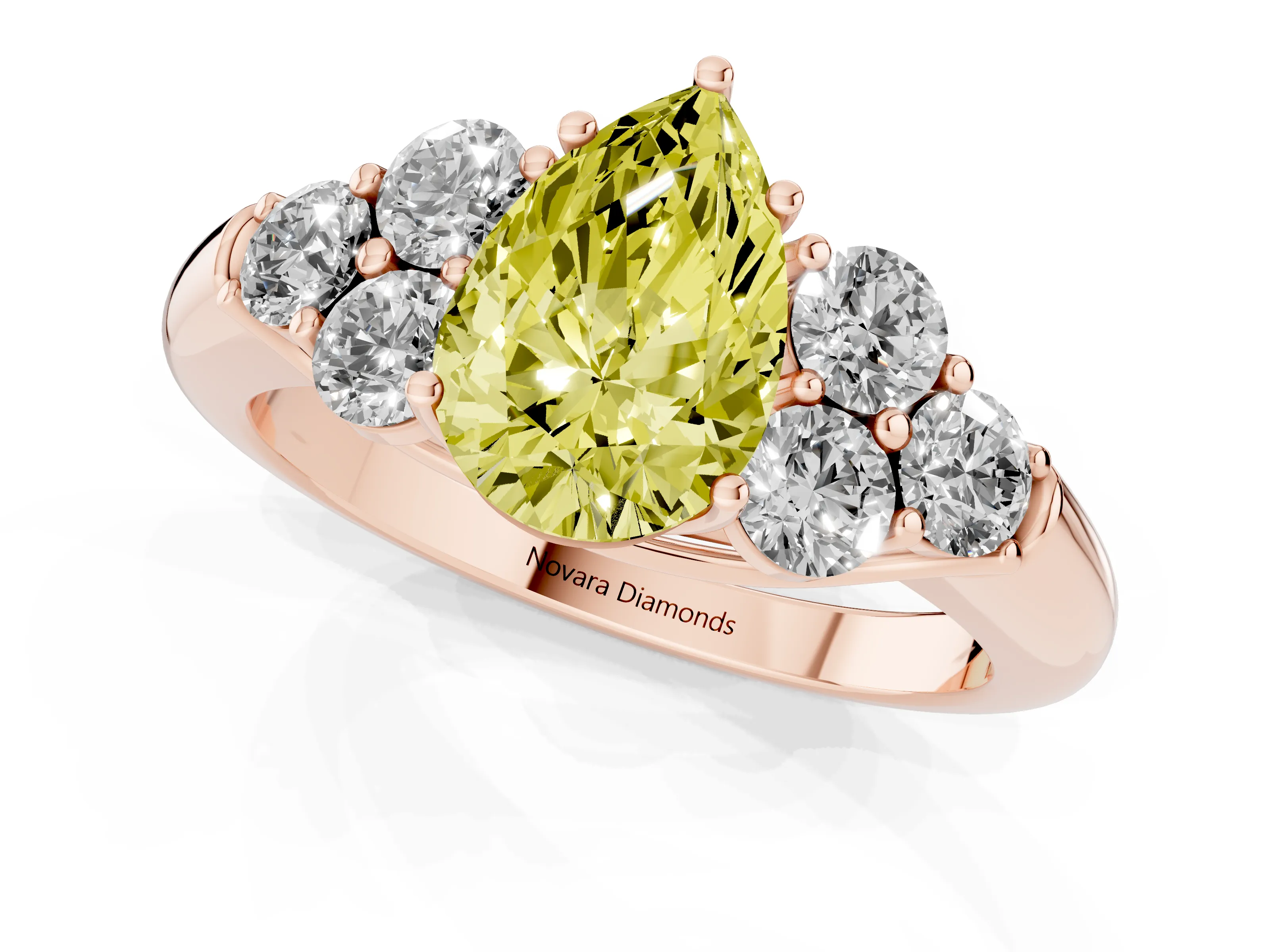 Fancy Yellow Pear Cut Diamond Cluster Ring Set in Rose gold with Round Accent Stones and Prong Setting on a Plain Band