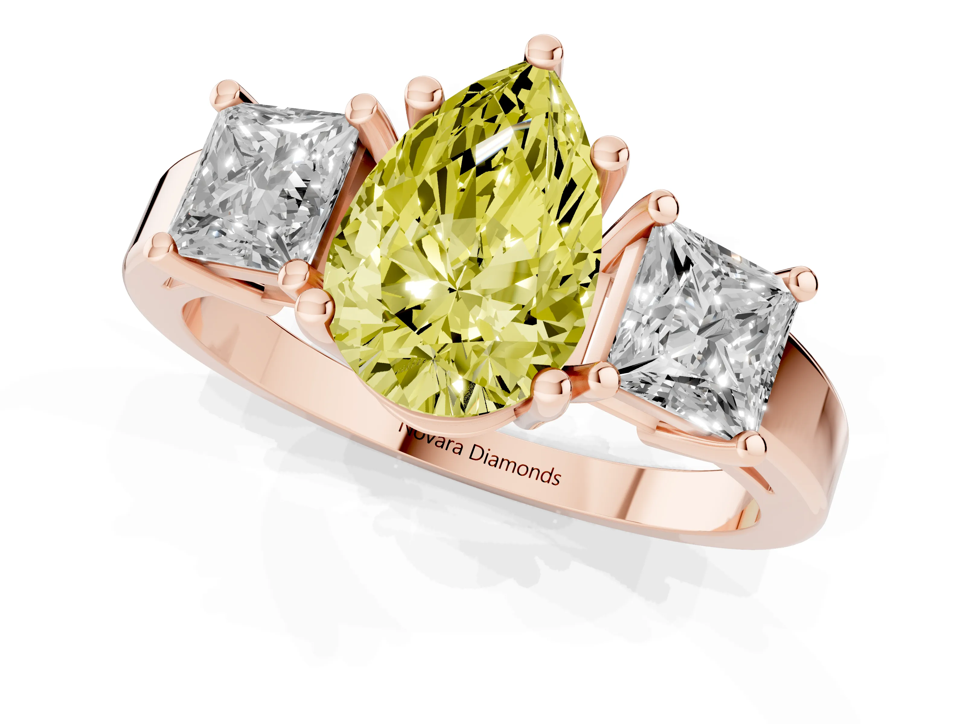 Fancy Yellow Three-Stone Pear Cut Diamond Solitaire Ring Set in Rose gold with Prong Setting