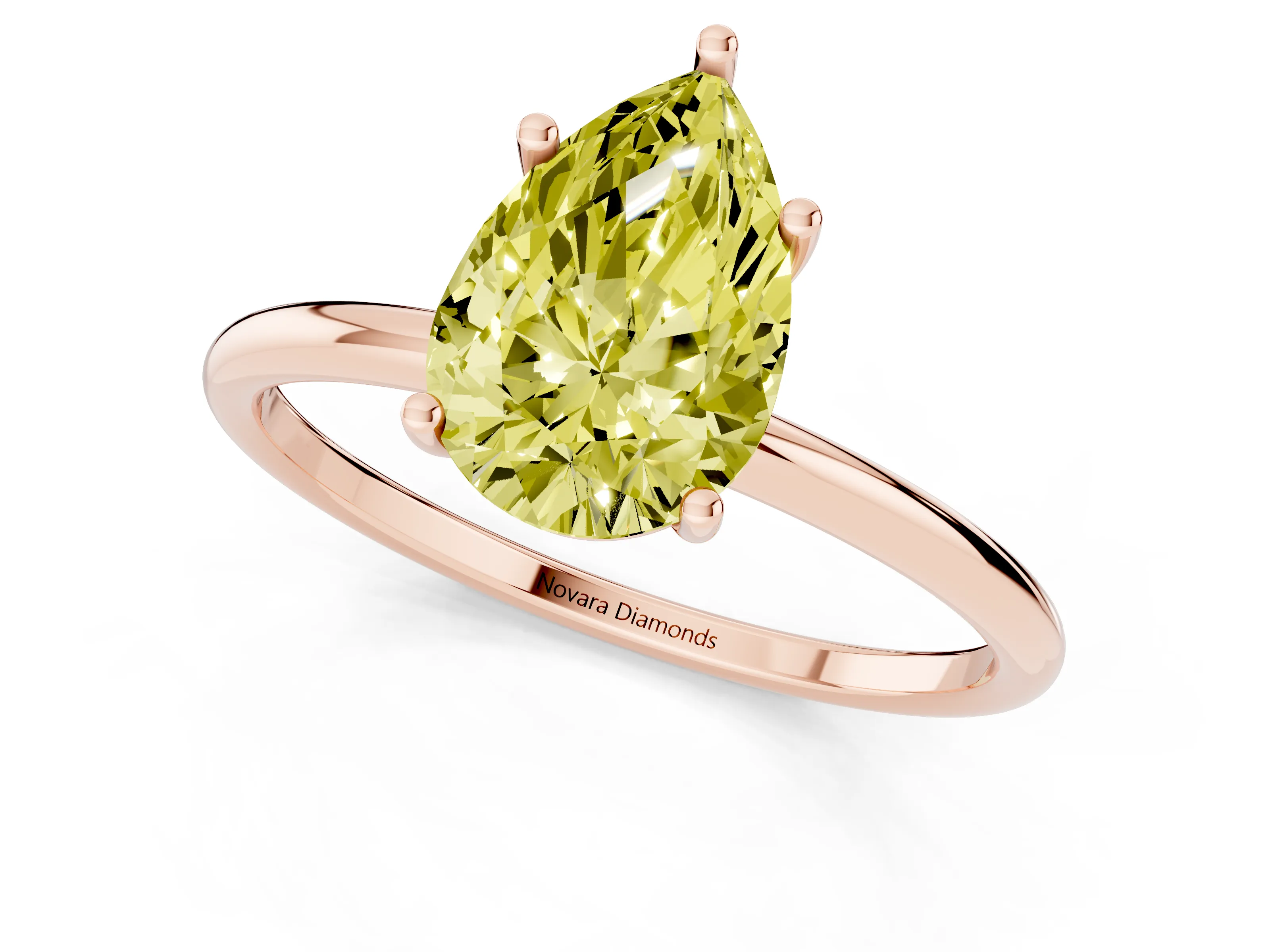 Fancy Yellow Pear Cut Diamond Solitaire Engagement Ring Set in Rose gold with Thin Band and Prong Setting