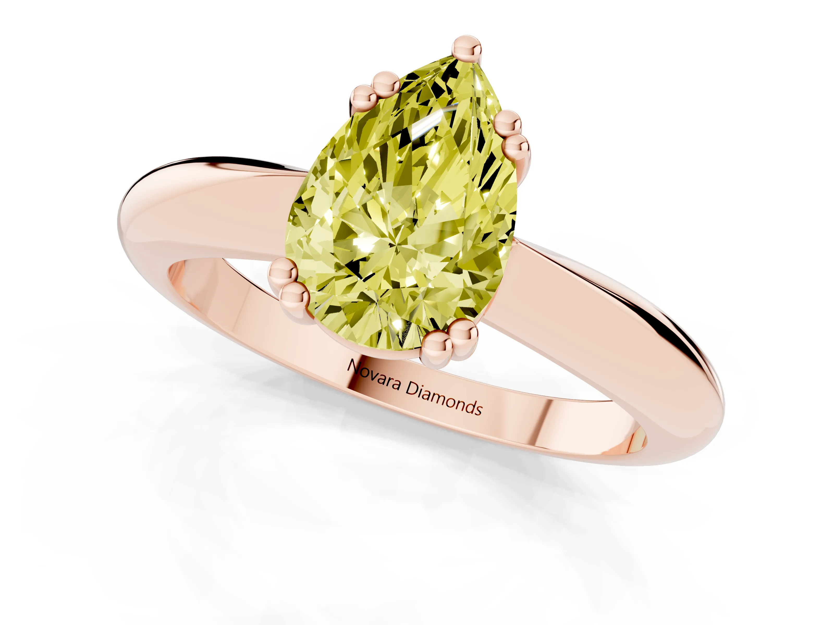 Fancy Yellow Pear Cut Diamond Solitaire Engagement Ring Set in Rose gold with Tapered Band and Prong Setting