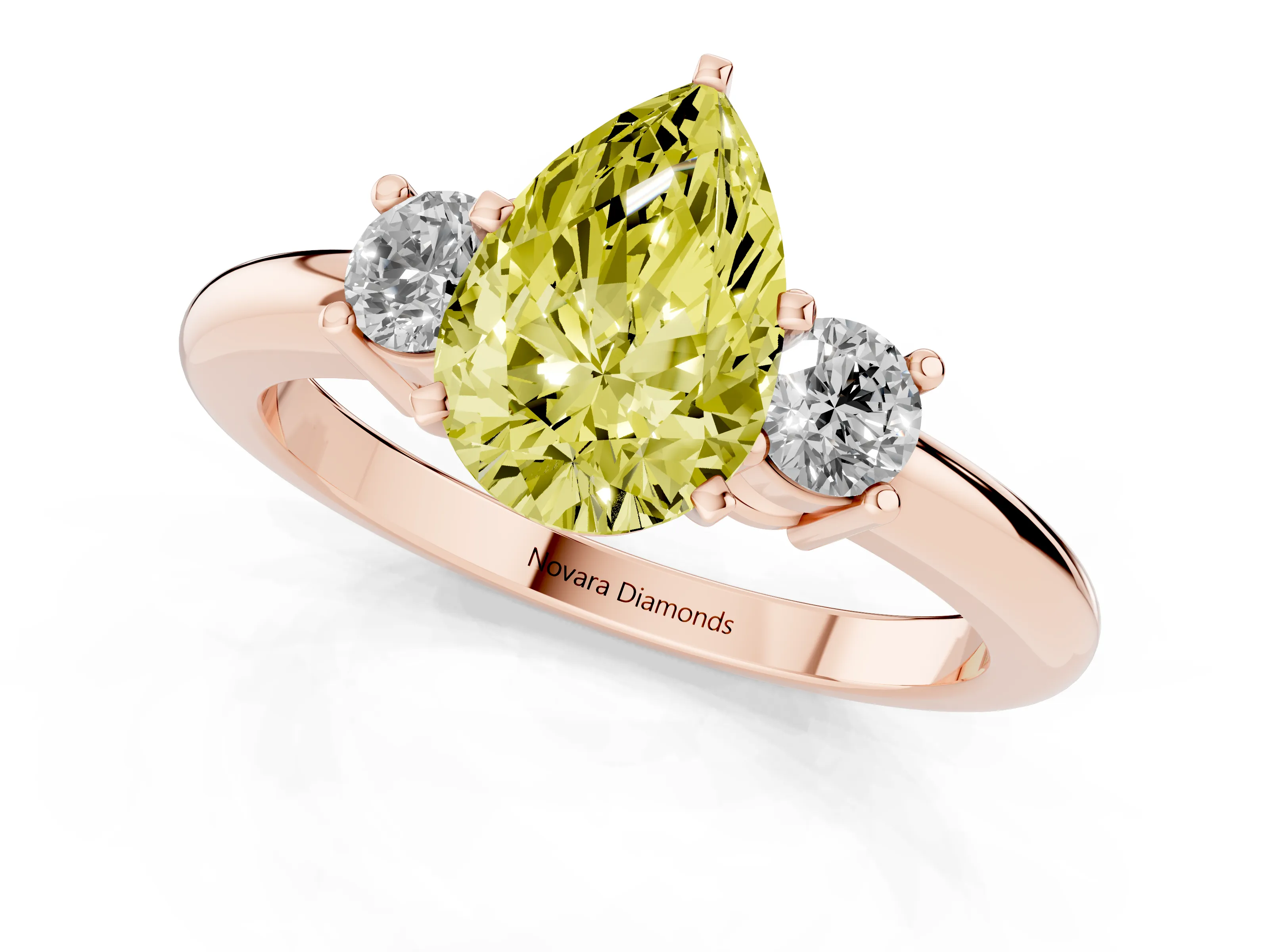 Fancy Yellow Three-Stone Pear Cut Diamond Ring Set in Rose gold with Prong Setting and Plain Band