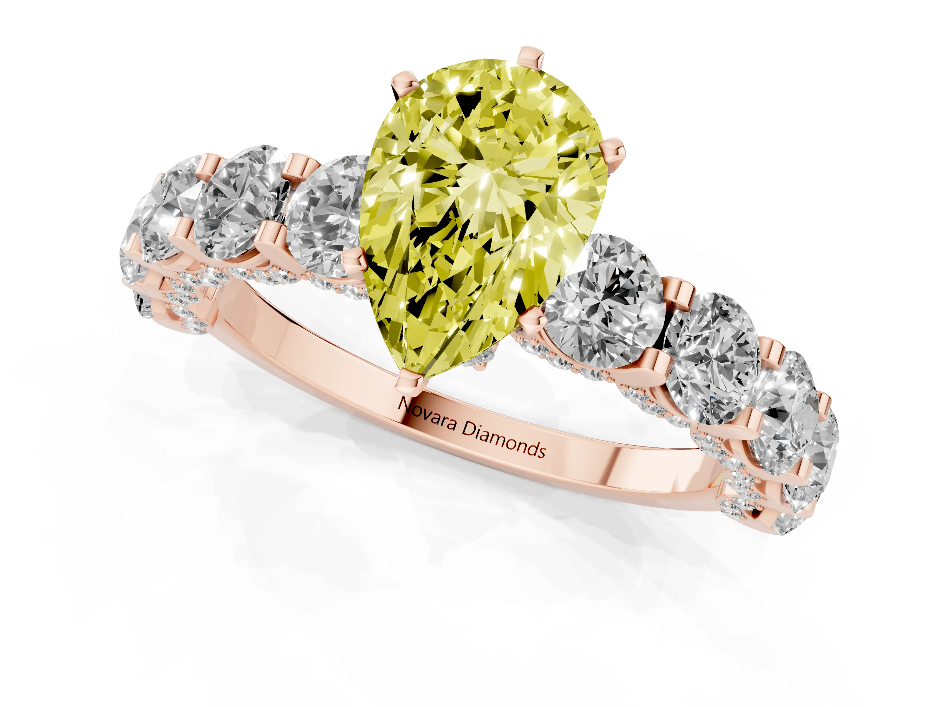 Fancy Yellow Pear Cut Diamond Side Stone Ring Set in Rose gold with Alternating Round and Oval Side Stones