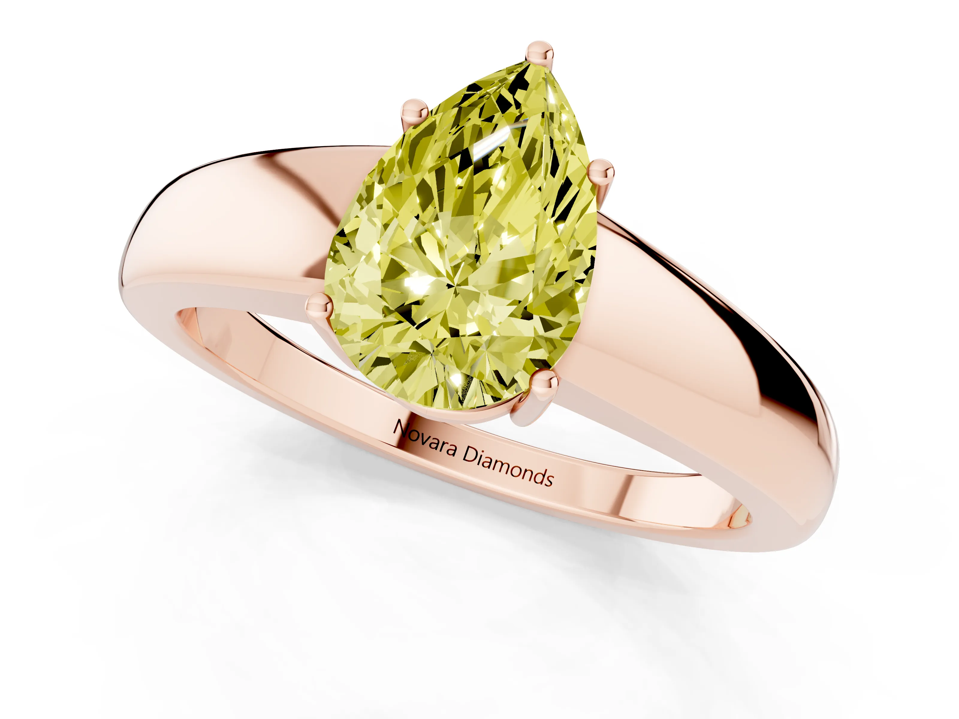 Fancy Yellow Pear Cut Diamond Solitaire Ring Set in Rose gold with Tapered Band and Prong Setting