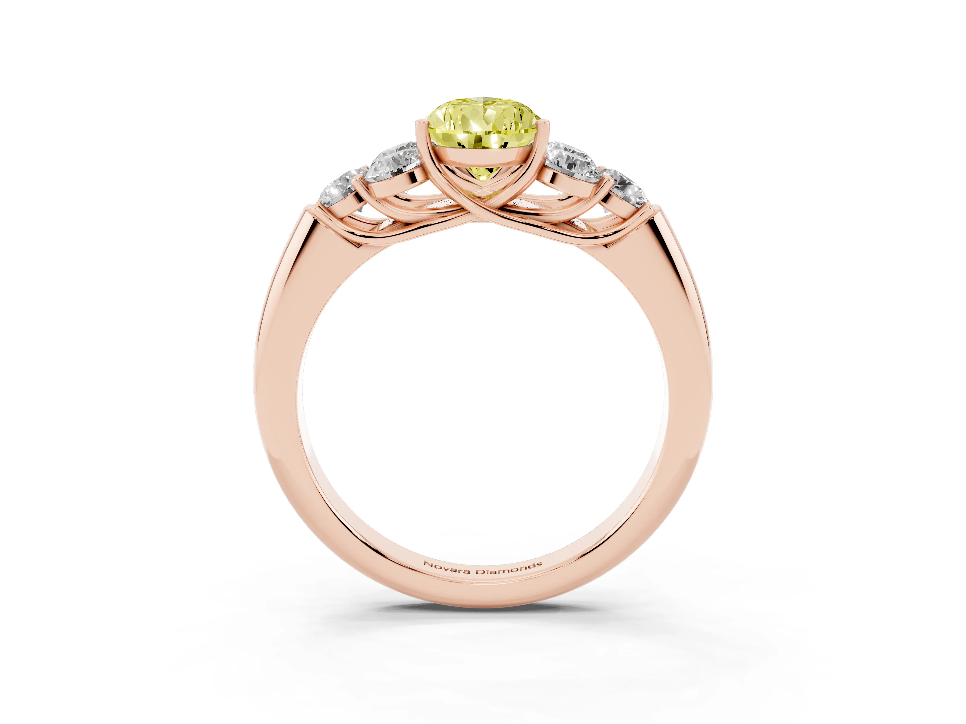 Fancy Yellow Pear Cut Diamond Cluster Ring Set in Rose gold with Round Accent Stones and Prong Setting on a Plain Band