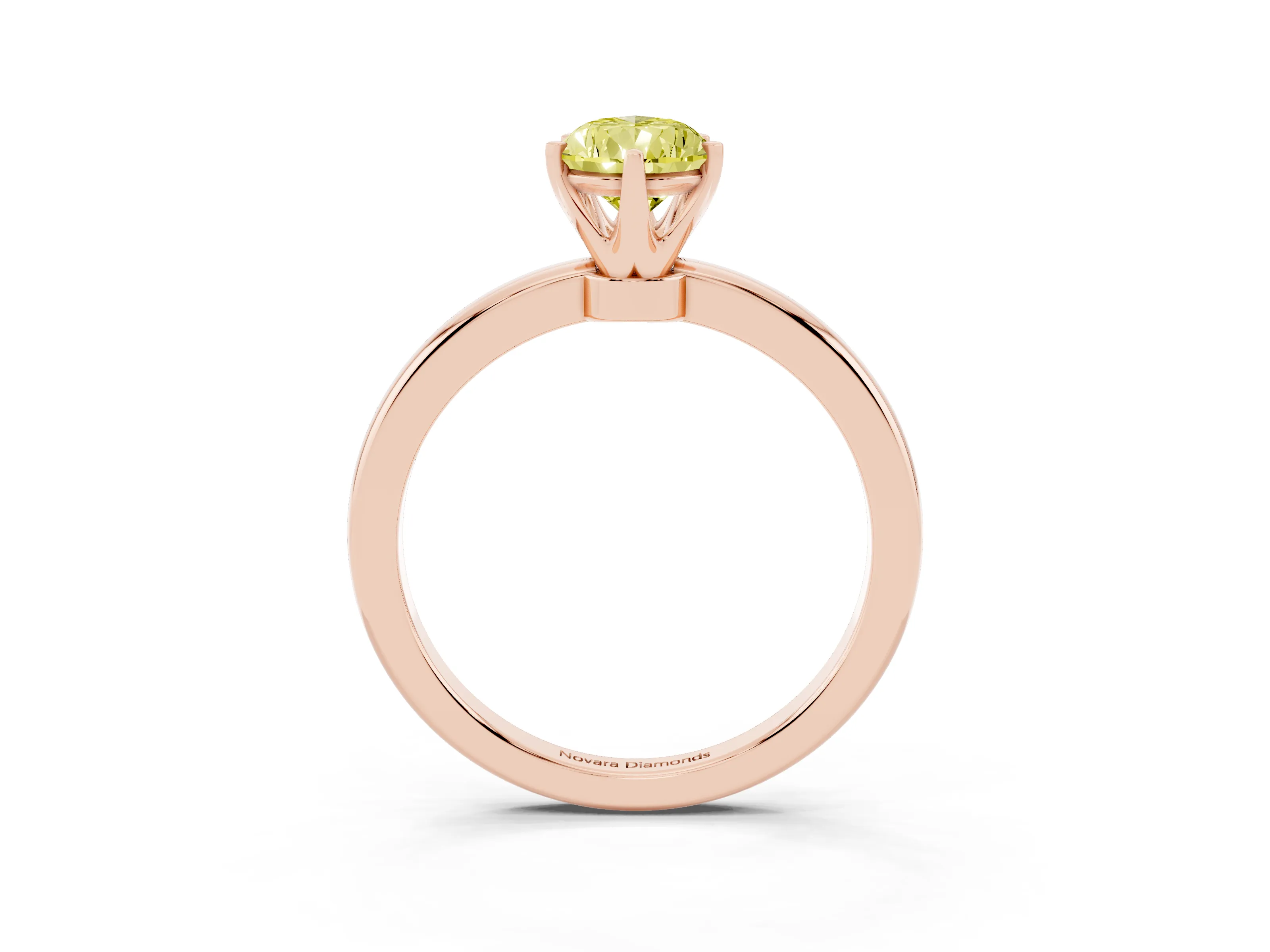 Fancy Yellow Pear Cut Diamond Solitaire Ring Set in Rose gold with Raised Prong Setting on a Classic Band