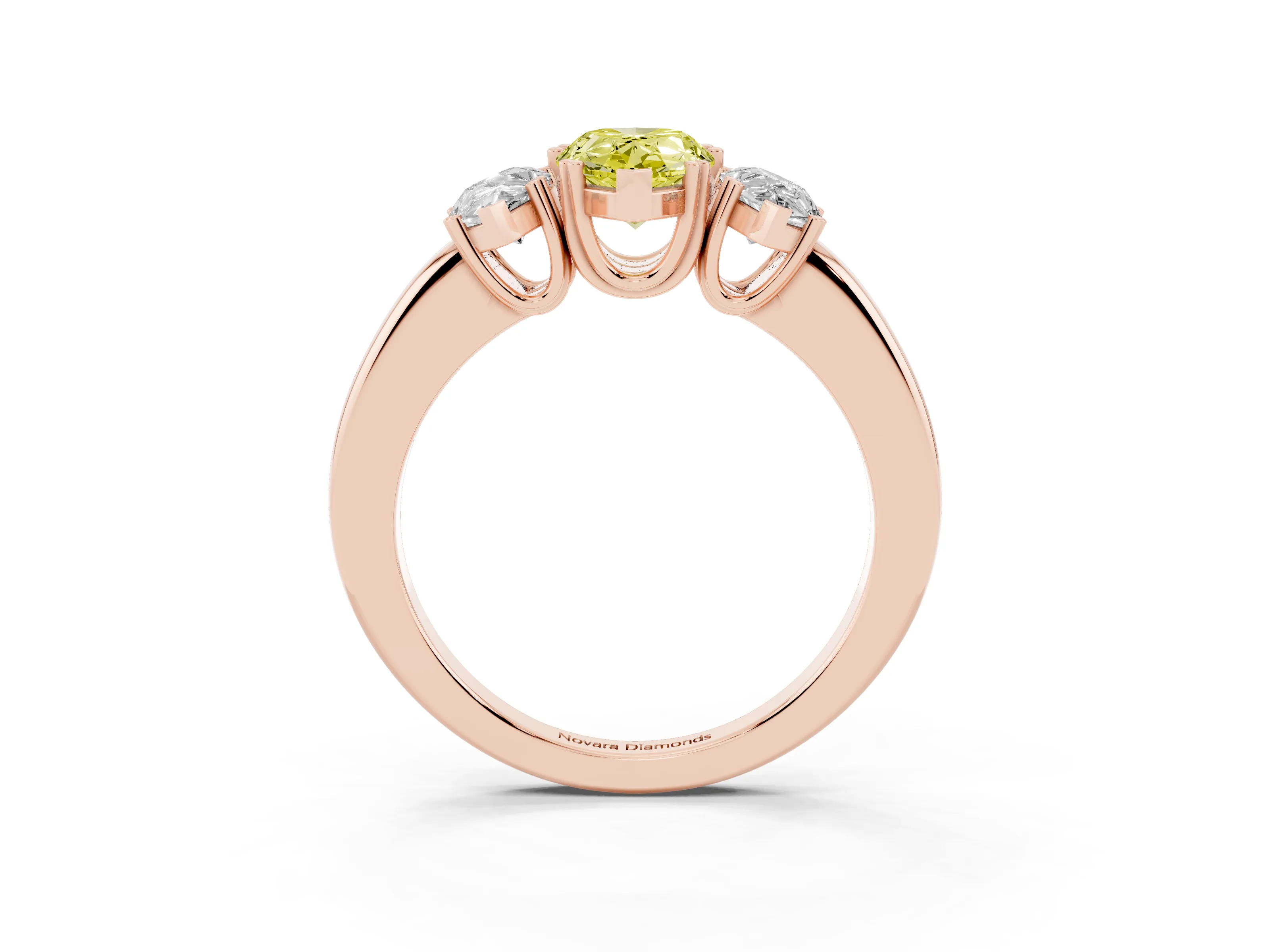 Fancy Yellow Pear Cut Diamond Three-Stone Ring Set in Rose gold with Polished Channel-Set Band