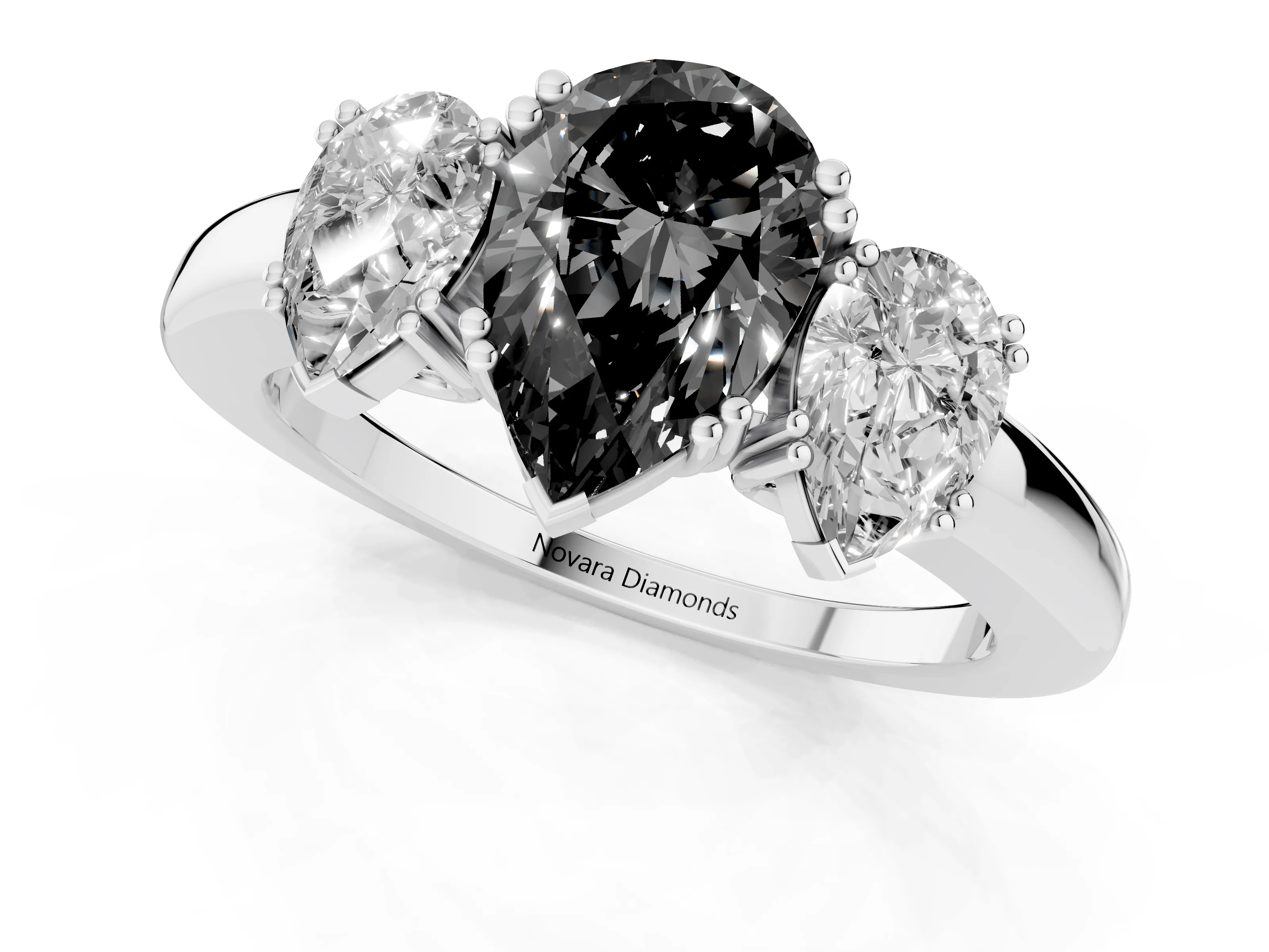 Fancy Black Pear Cut Diamond Three-Stone Ring Set in White gold with Polished Channel-Set Band