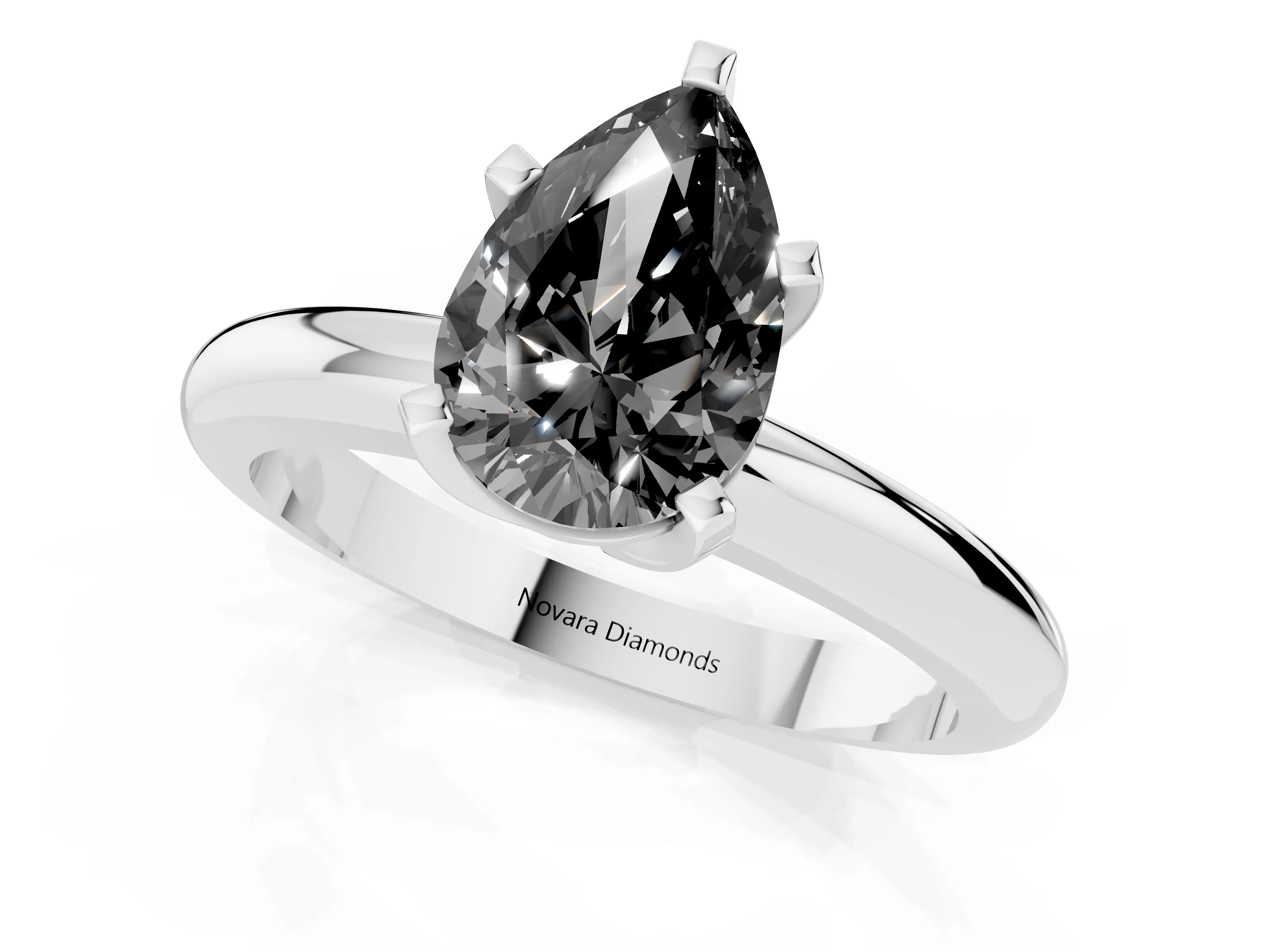 Fancy Black Pear Cut Diamond Solitaire Engagement Ring Set in White gold with Round Band and Prong Setting