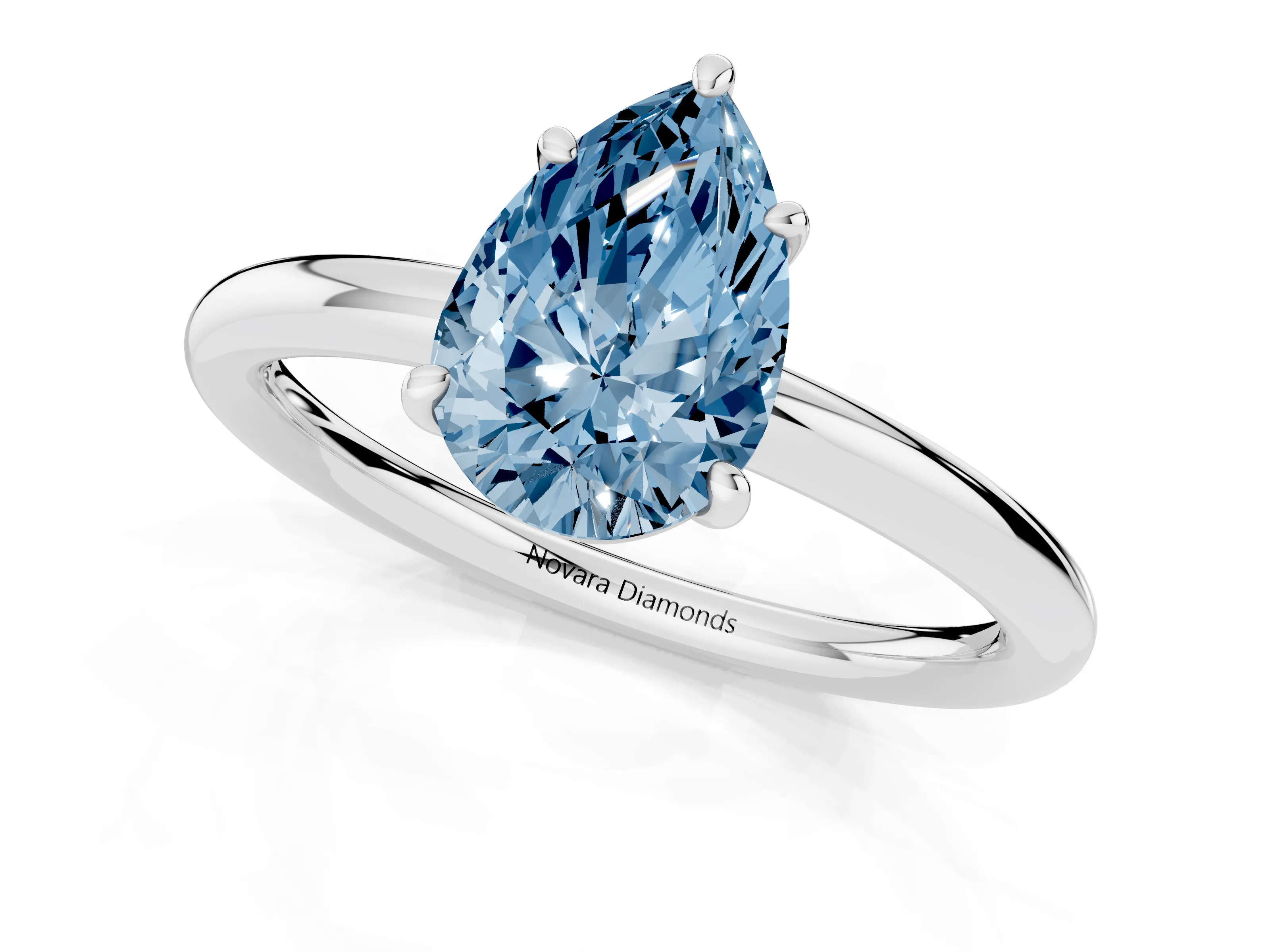 Fancy Blue Pear Cut Diamond Solitaire Ring Set in White gold with Prong Setting on a Polished Plain Band