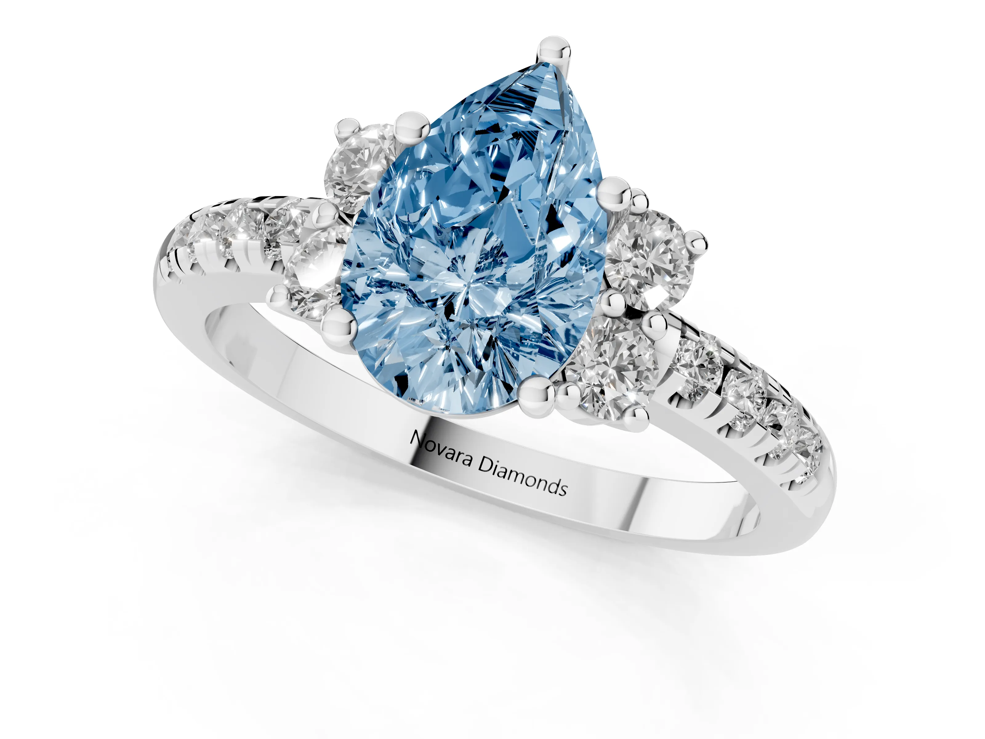 Fancy Blue Pear Cut Diamond Three-Stone Pavé Ring Set in White gold with Prong Setting