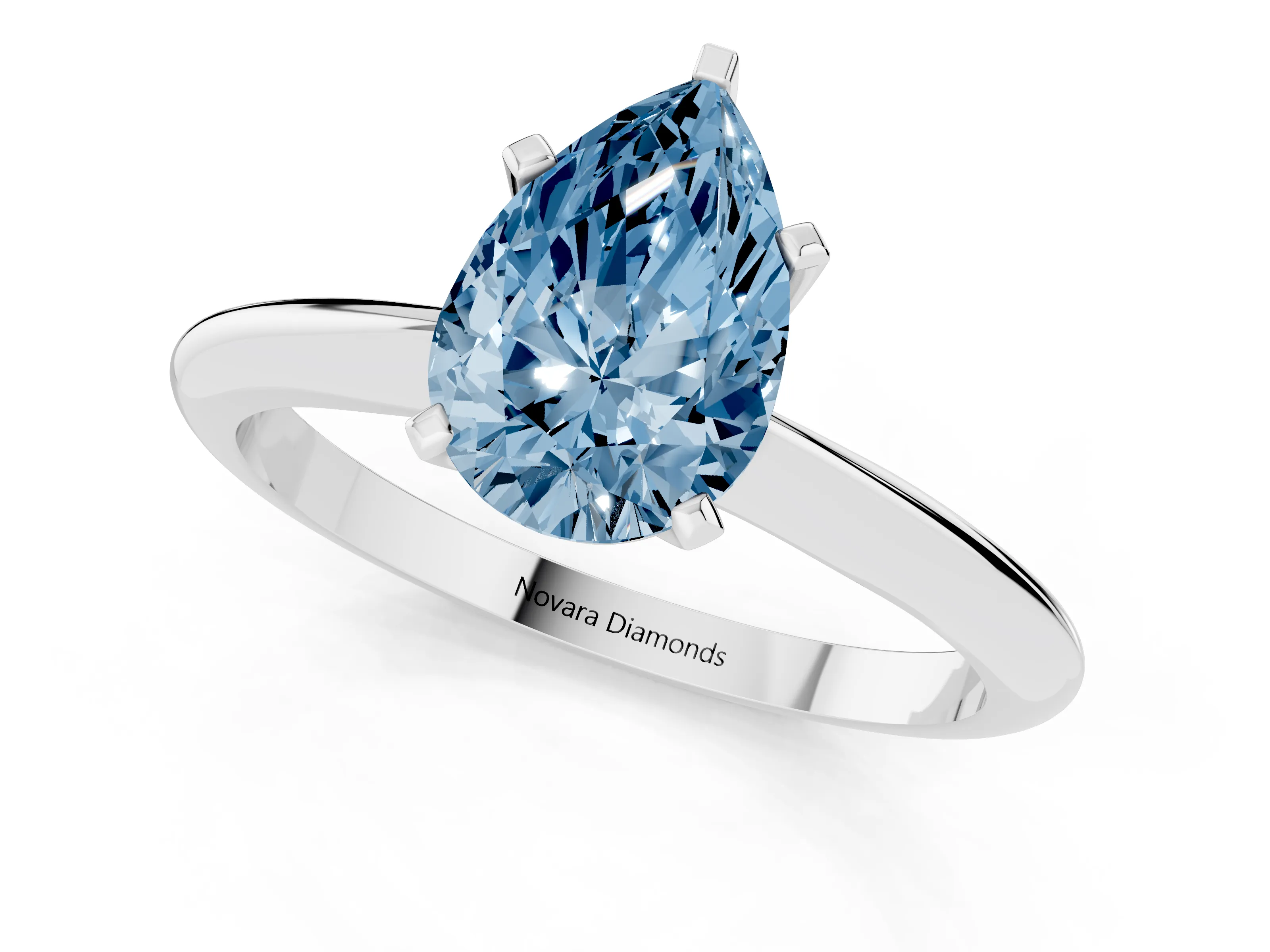 Fancy Blue Pear Cut Diamond Solitaire Ring Set in Platinum with Prong Setting on a Plain Round Band