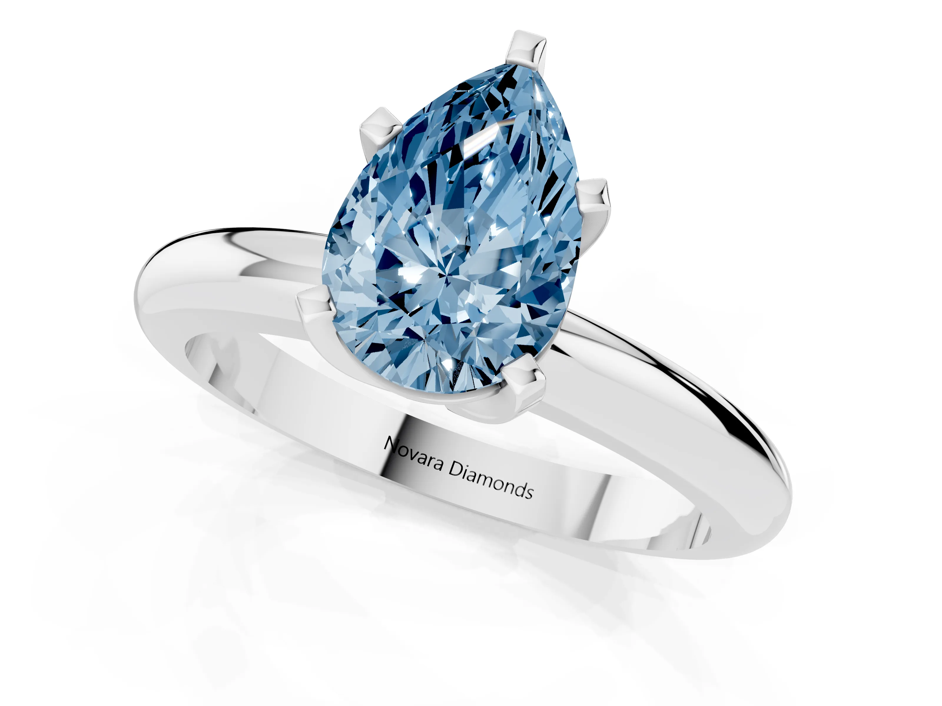 Fancy Blue Pear Cut Diamond Solitaire Engagement Ring Set in White gold with Round Band and Prong Setting