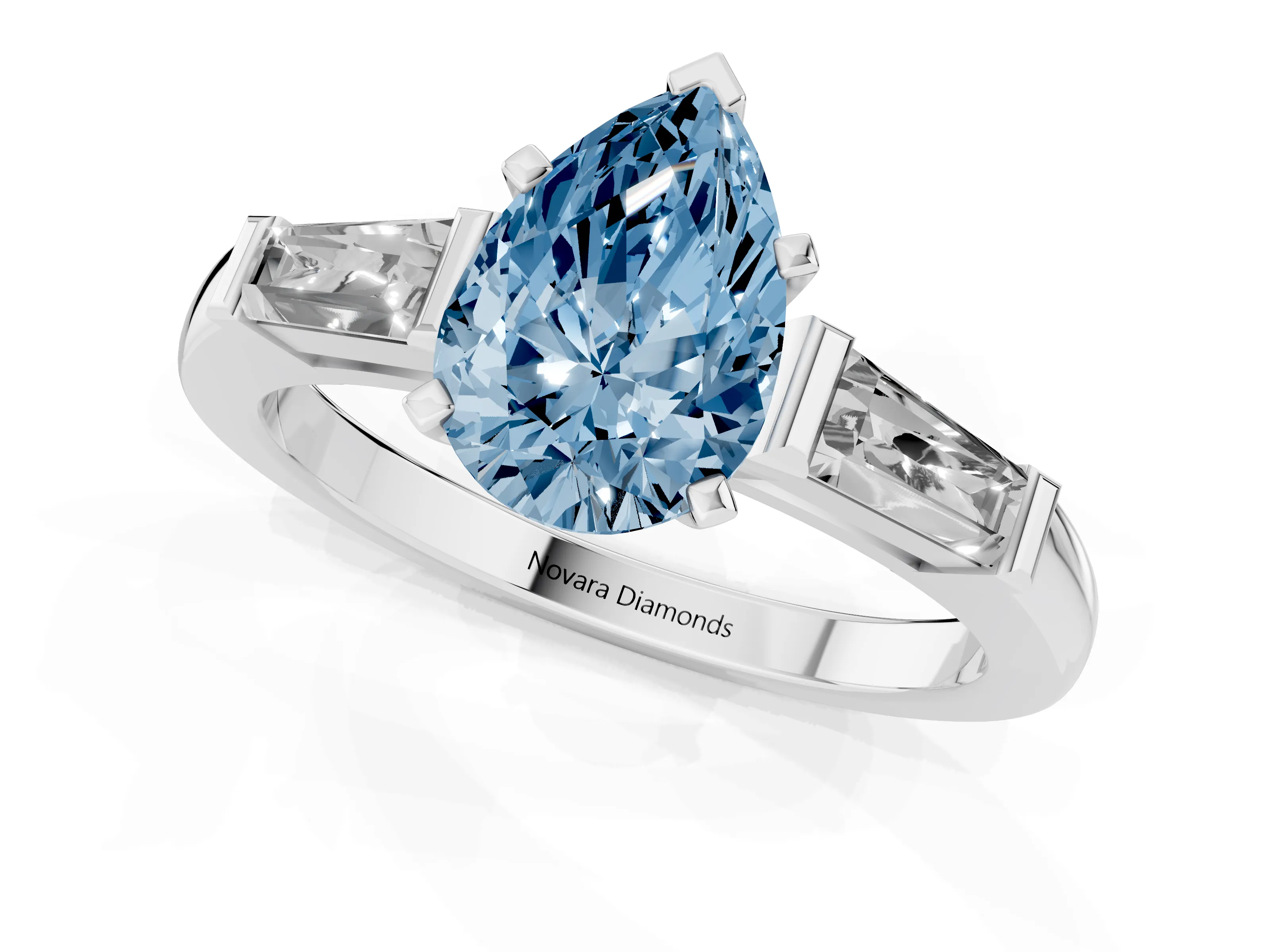 Fancy Blue Pear Cut Diamond Solitaire Ring Set in Platinum with Tapered Baguette Side Stones and Prong Setting