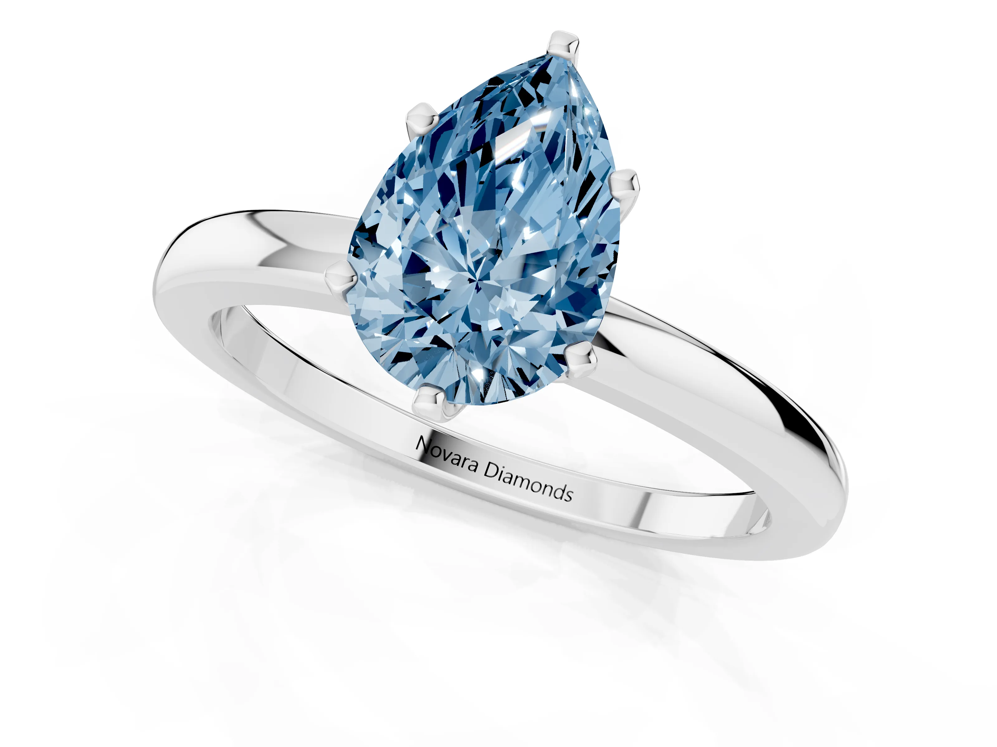 Fancy Blue Pear Cut Diamond Solitaire Ring Set in White gold with Raised Prong Setting on a Classic Band