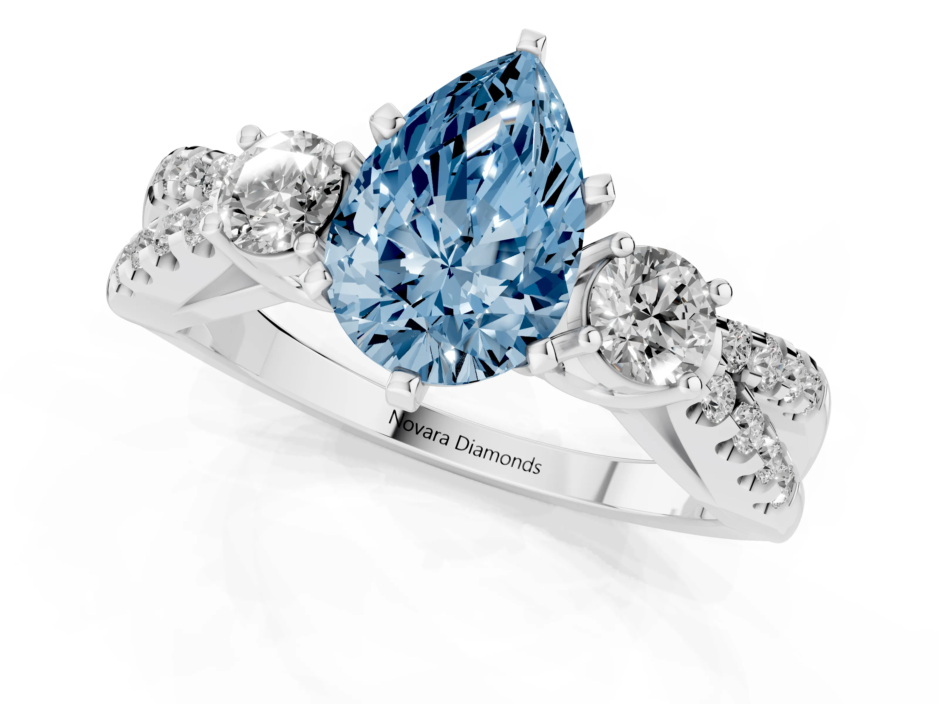 Fancy Blue Pear Cut Diamond Three-Stone Ring Set in Platinum with Pavé Split Shank and Prong Setting