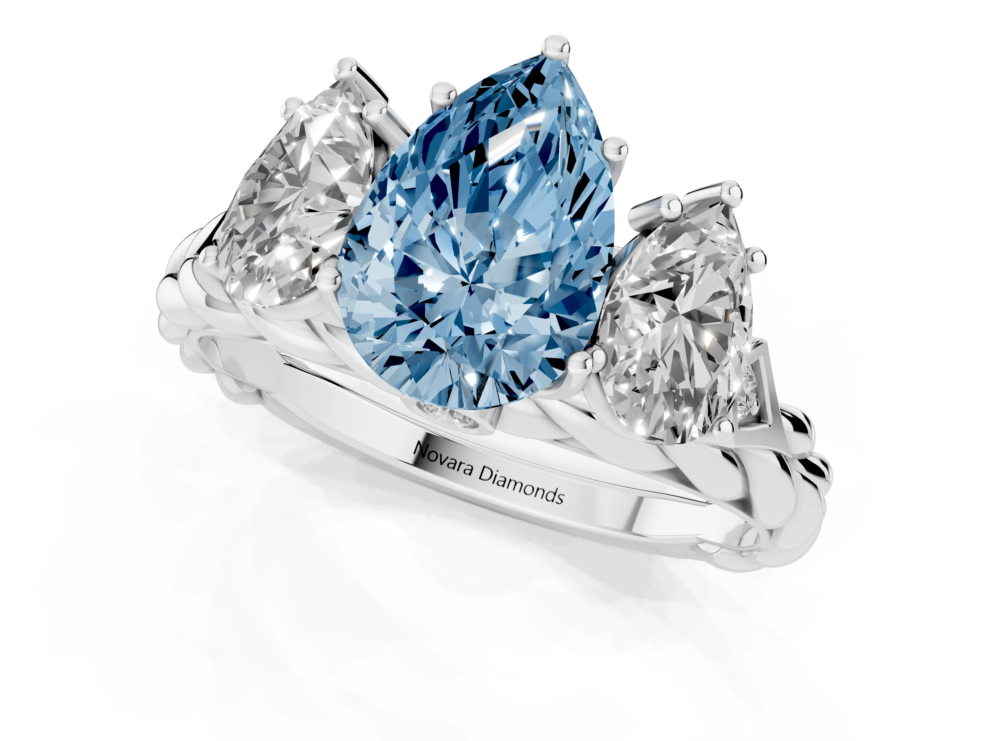 Fancy Blue Pear Cut Diamond Three-Stone Ring Set in Silver with Braided Band