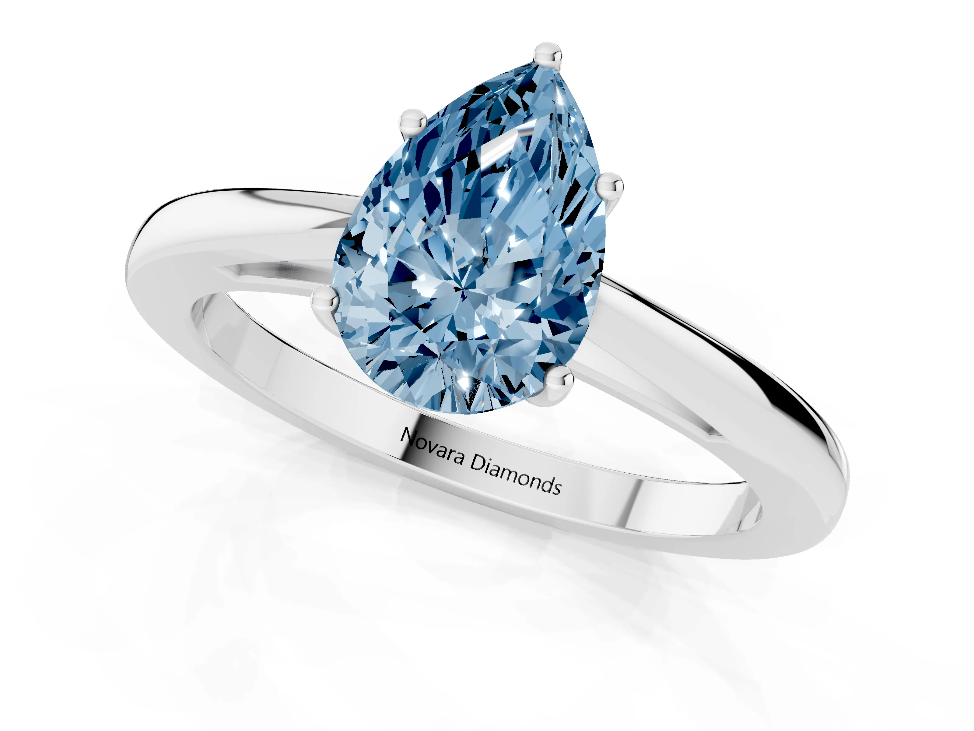 Fancy Blue Pear Cut Diamond Solitaire Ring Set in Silver with Split Shank and Prong Setting