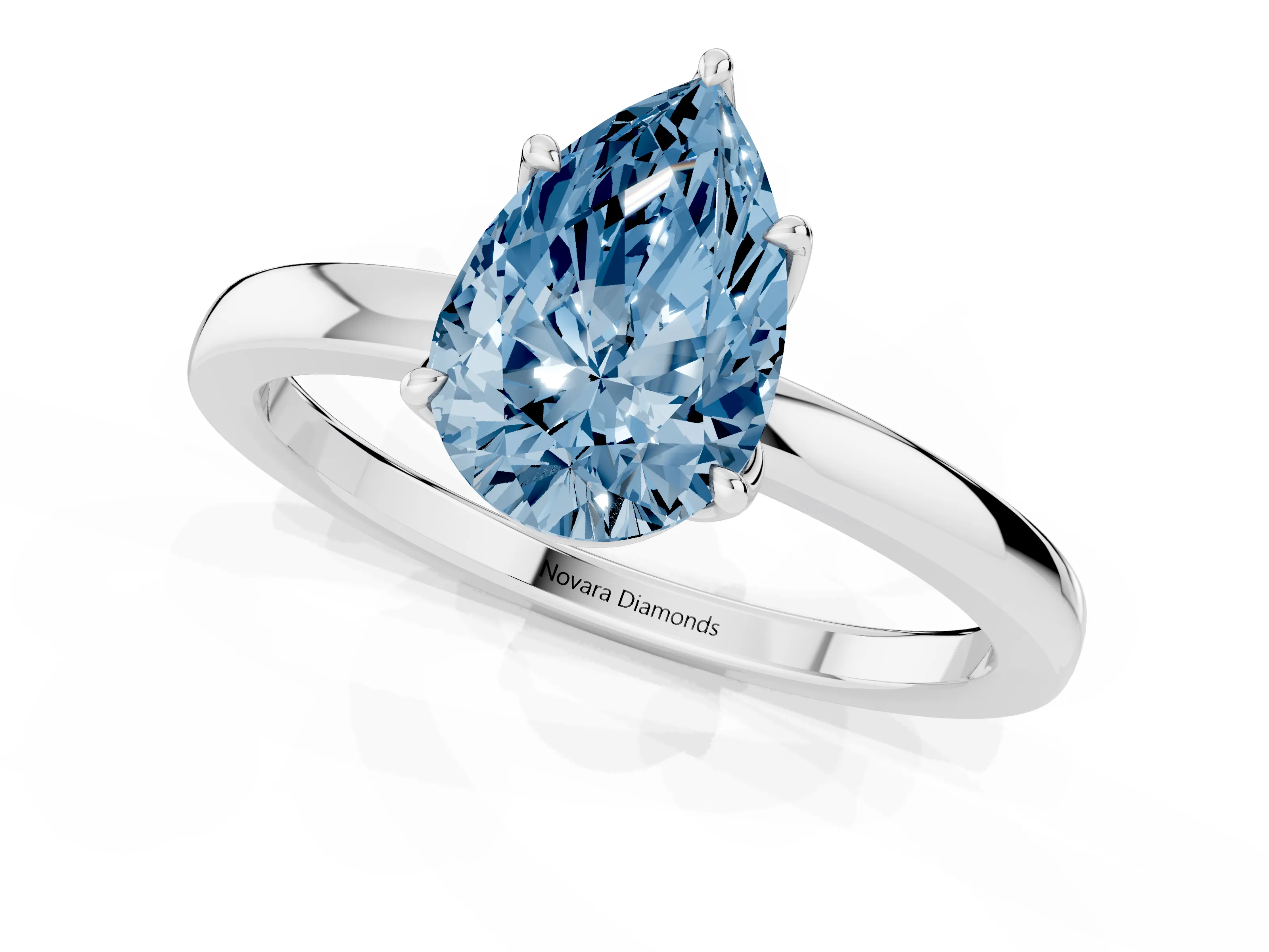 Fancy Blue Pear Cut Diamond Solitaire Ring Set in White gold with Prong Setting and Thin Polished Band