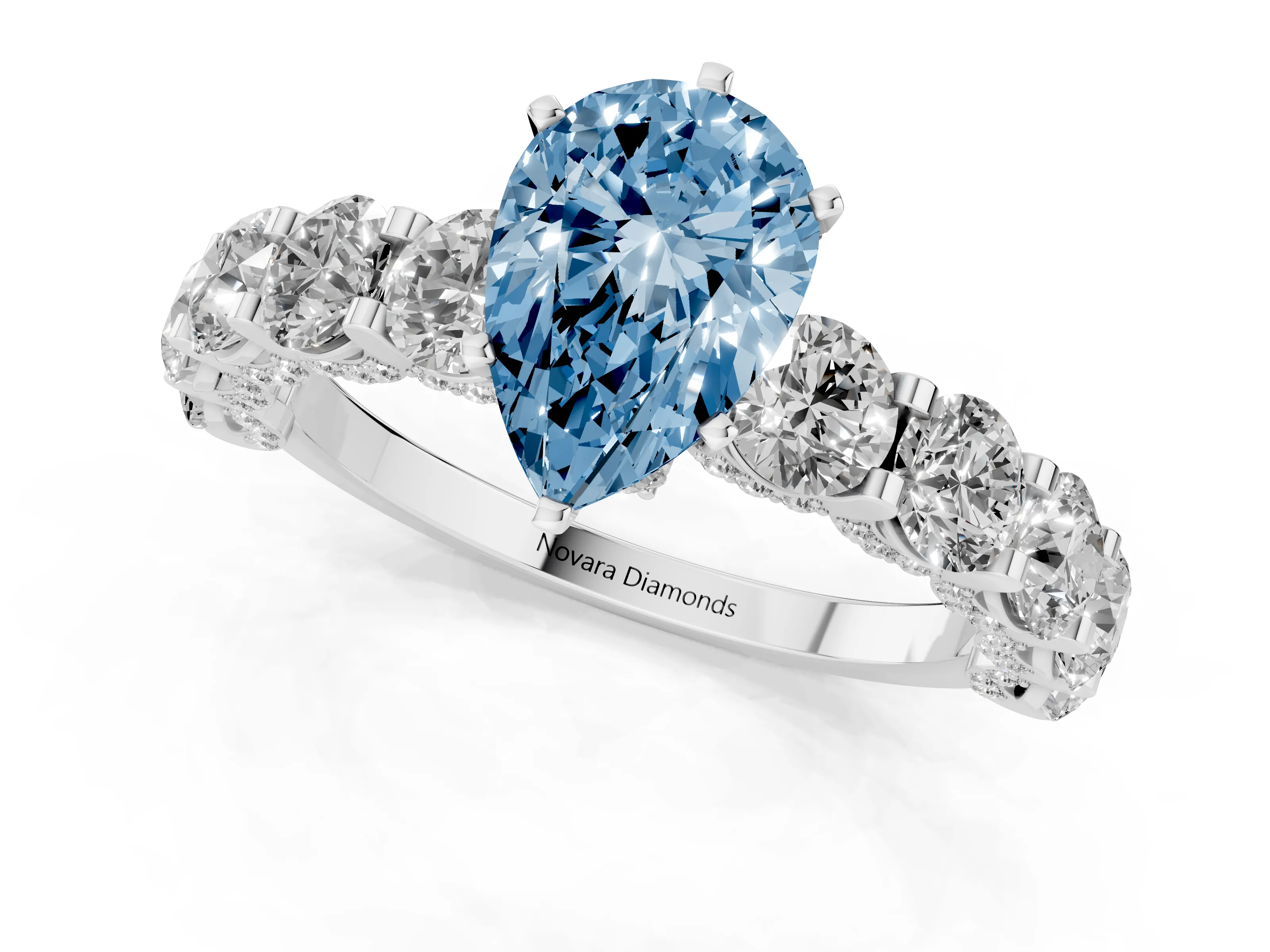 Fancy Blue Pear Cut Diamond Side Stone Ring Set in Platinum with Alternating Round and Oval Side Stones
