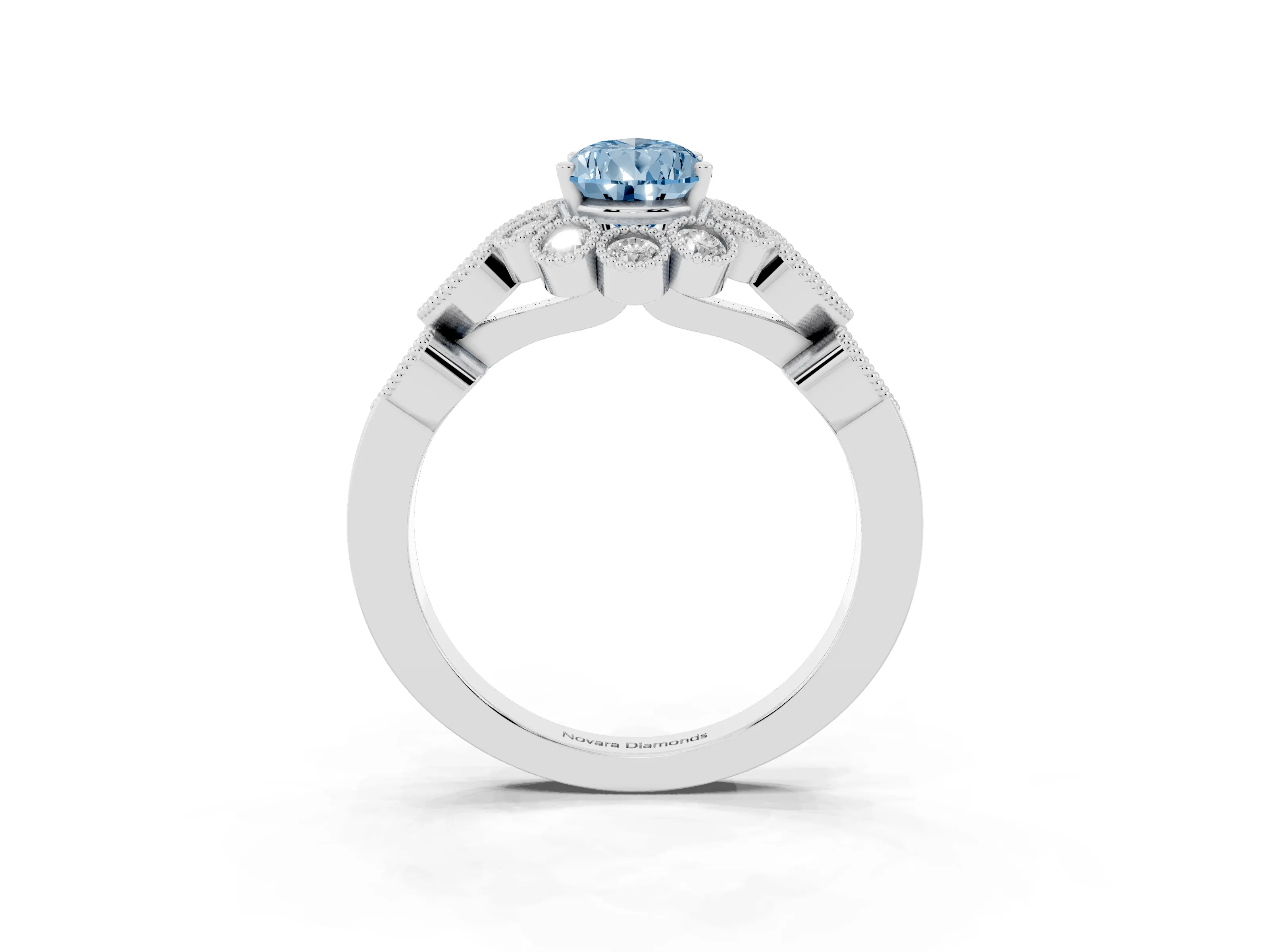 Fancy Blue Pear Cut Diamond Solitaire Ring Set in Platinum with Milgrain Pavé Heart Band