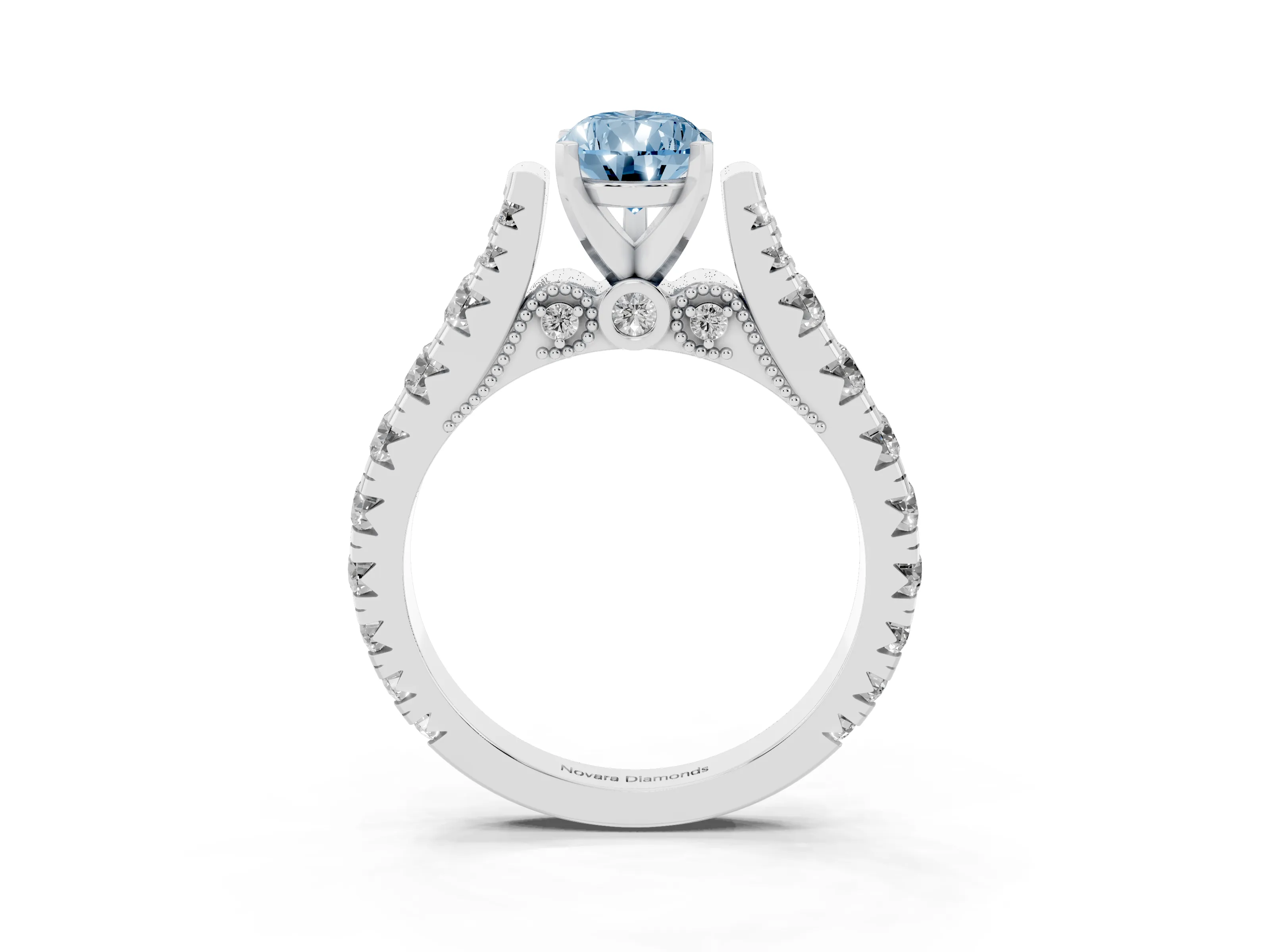 Fancy Blue Pear Cut Diamond Classic Solitaire Ring Set in Platinum with Pavé Band and Prong Setting