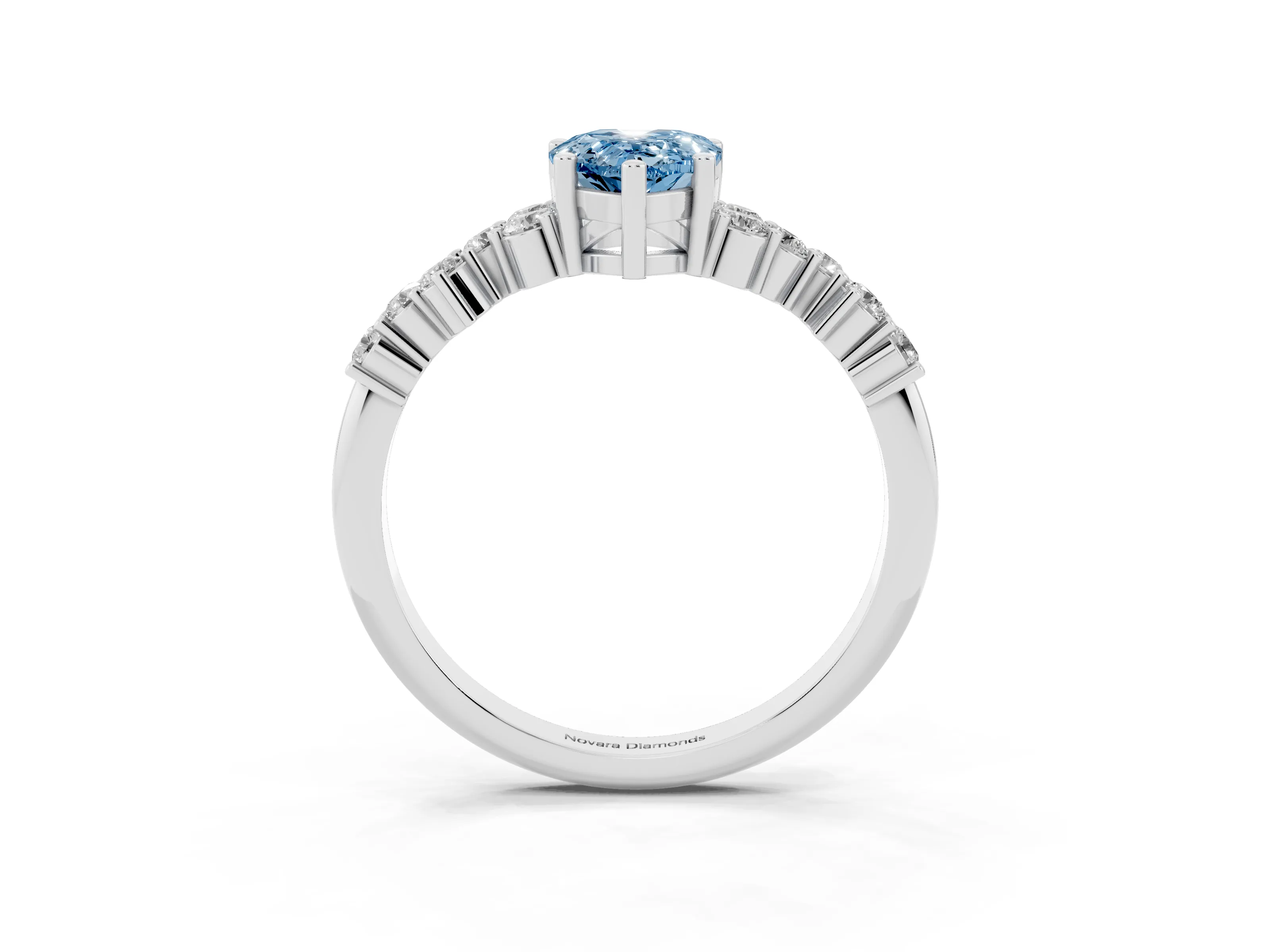 Fancy Blue Pear Cut Diamond Ring Set in Platinum with Scattered Round Accents