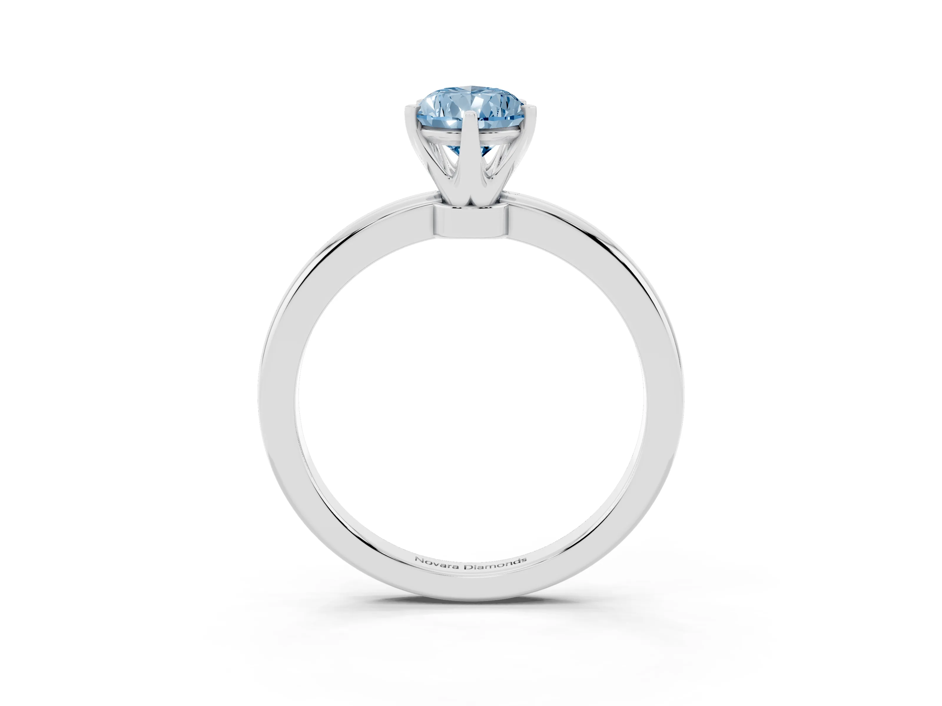 Fancy Blue Pear Cut Diamond Solitaire Ring Set in White gold with Raised Prong Setting on a Classic Band
