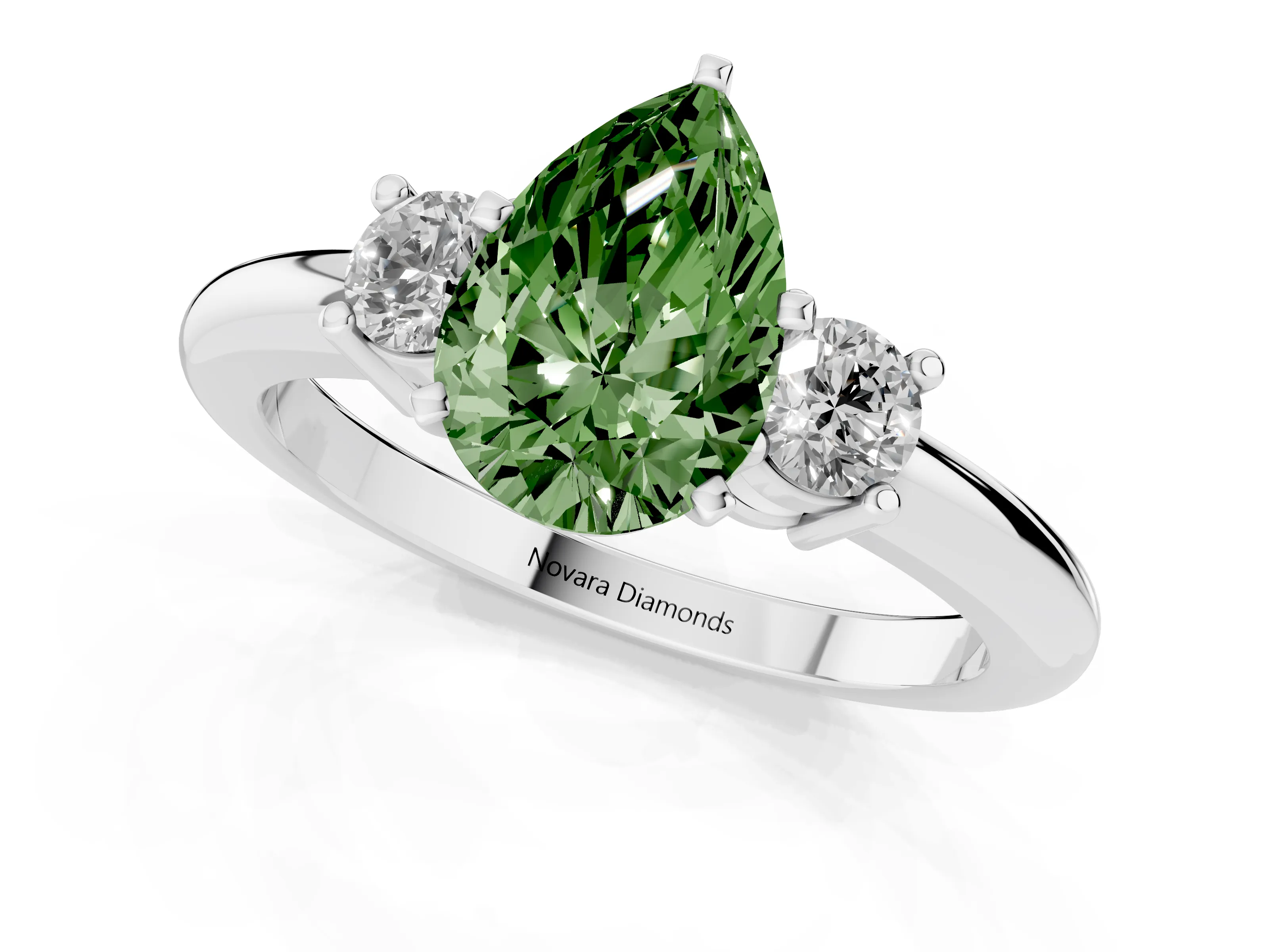 Fancy Green Three-Stone Pear Cut Diamond Ring Set in Platinum with Prong Setting and Plain Band
