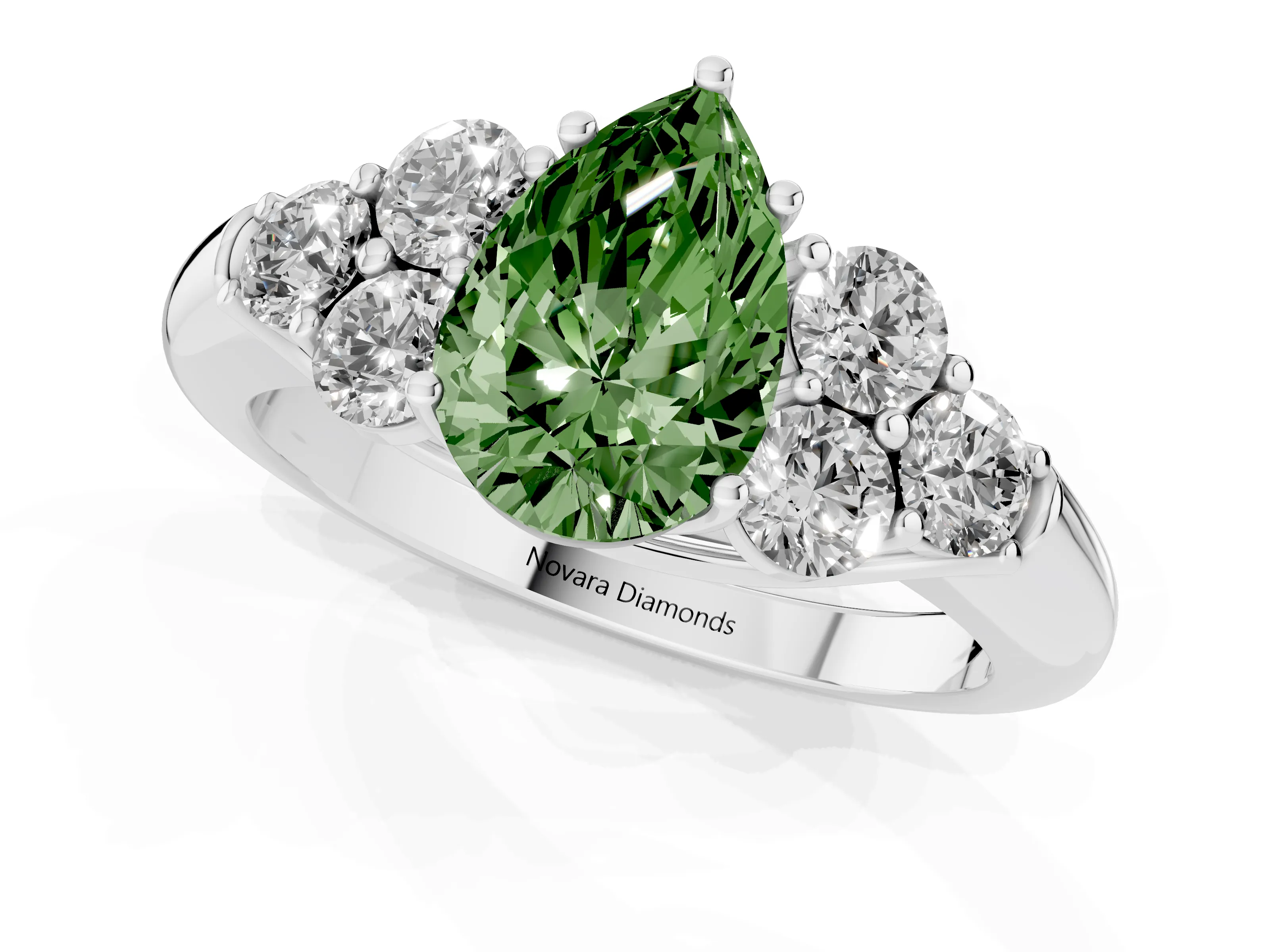 Fancy Green Pear Cut Diamond Cluster Ring Set in Silver with Round Accent Stones and Prong Setting on a Plain Band