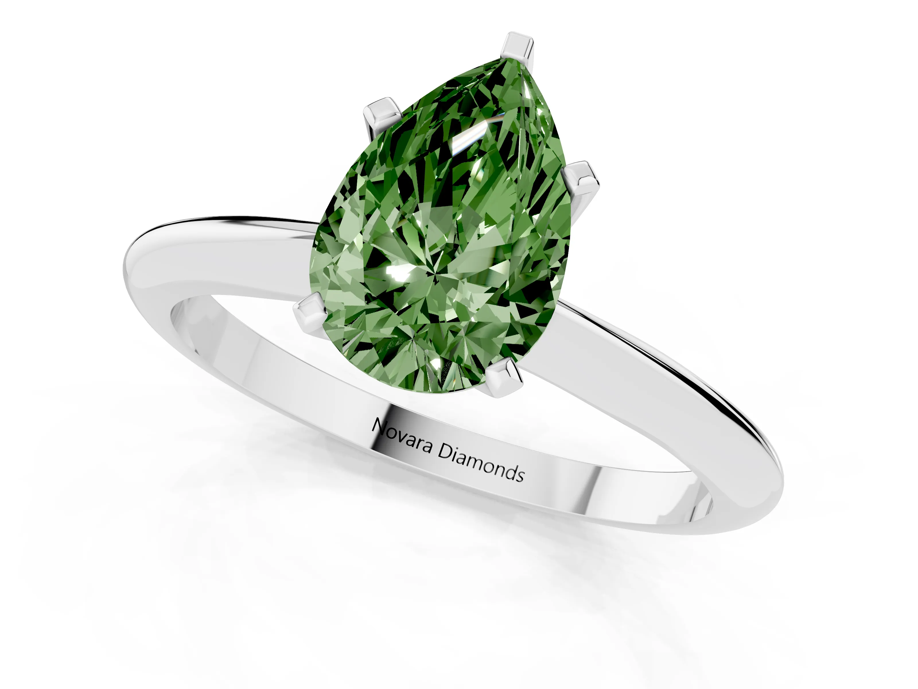 Fancy Green Pear Cut Diamond Solitaire Ring Set in Silver with Prong Setting on a Plain Round Band