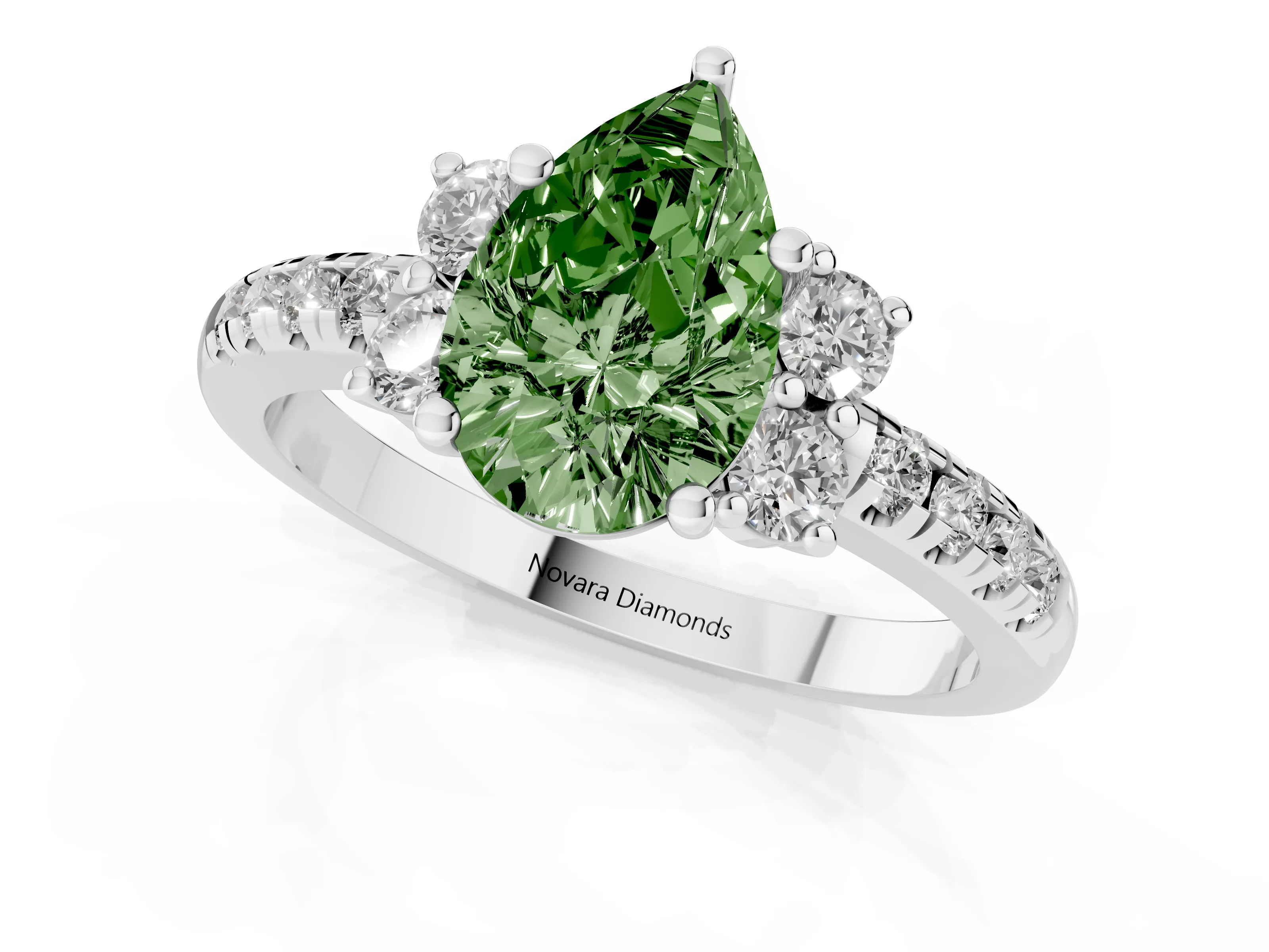 Fancy Green Pear Cut Diamond Three-Stone Pavé Ring Set in White gold with Prong Setting