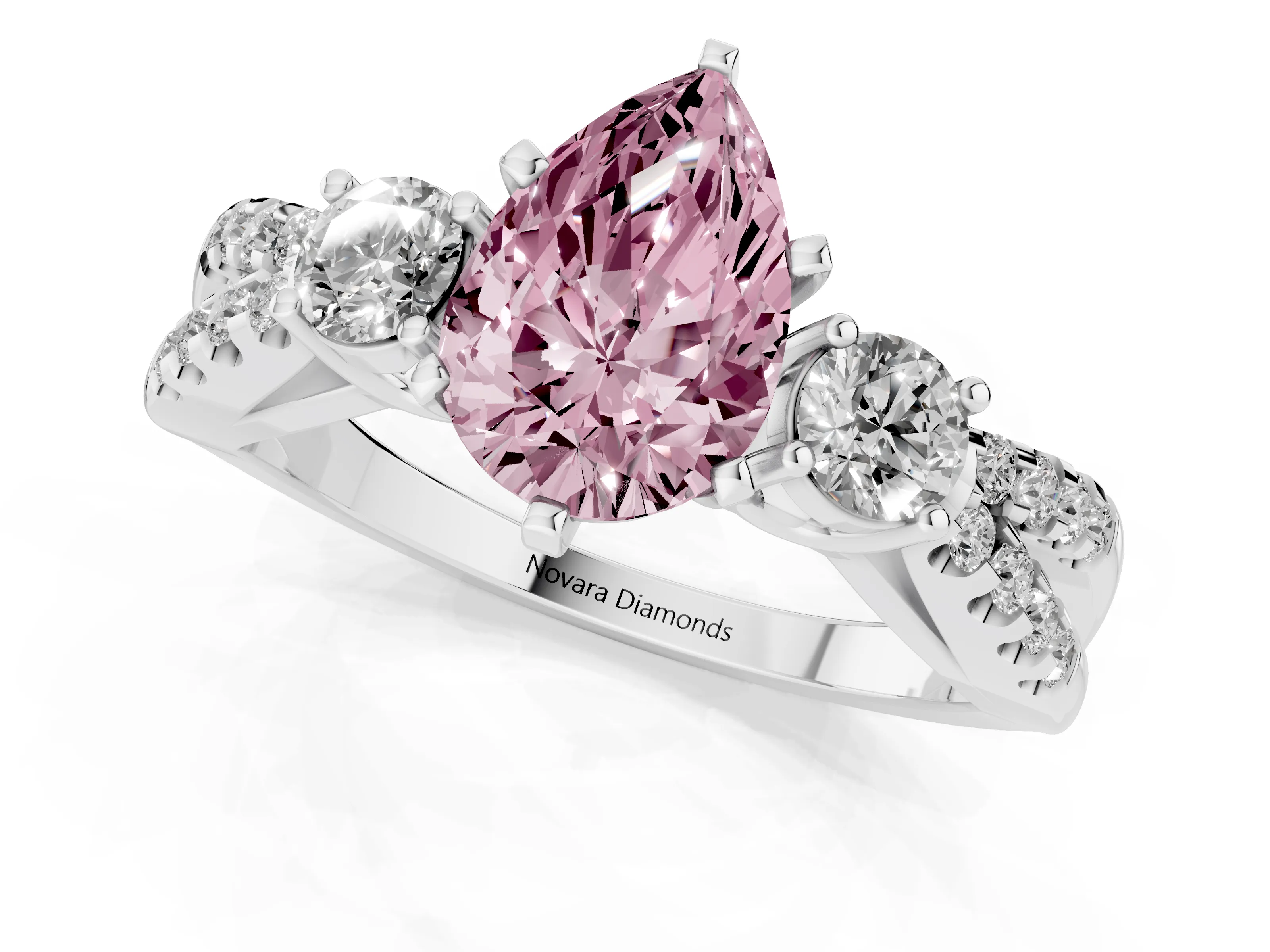 Fancy Pink Pear Cut Diamond Three-Stone Ring Set in White gold with Pavé Split Shank and Prong Setting