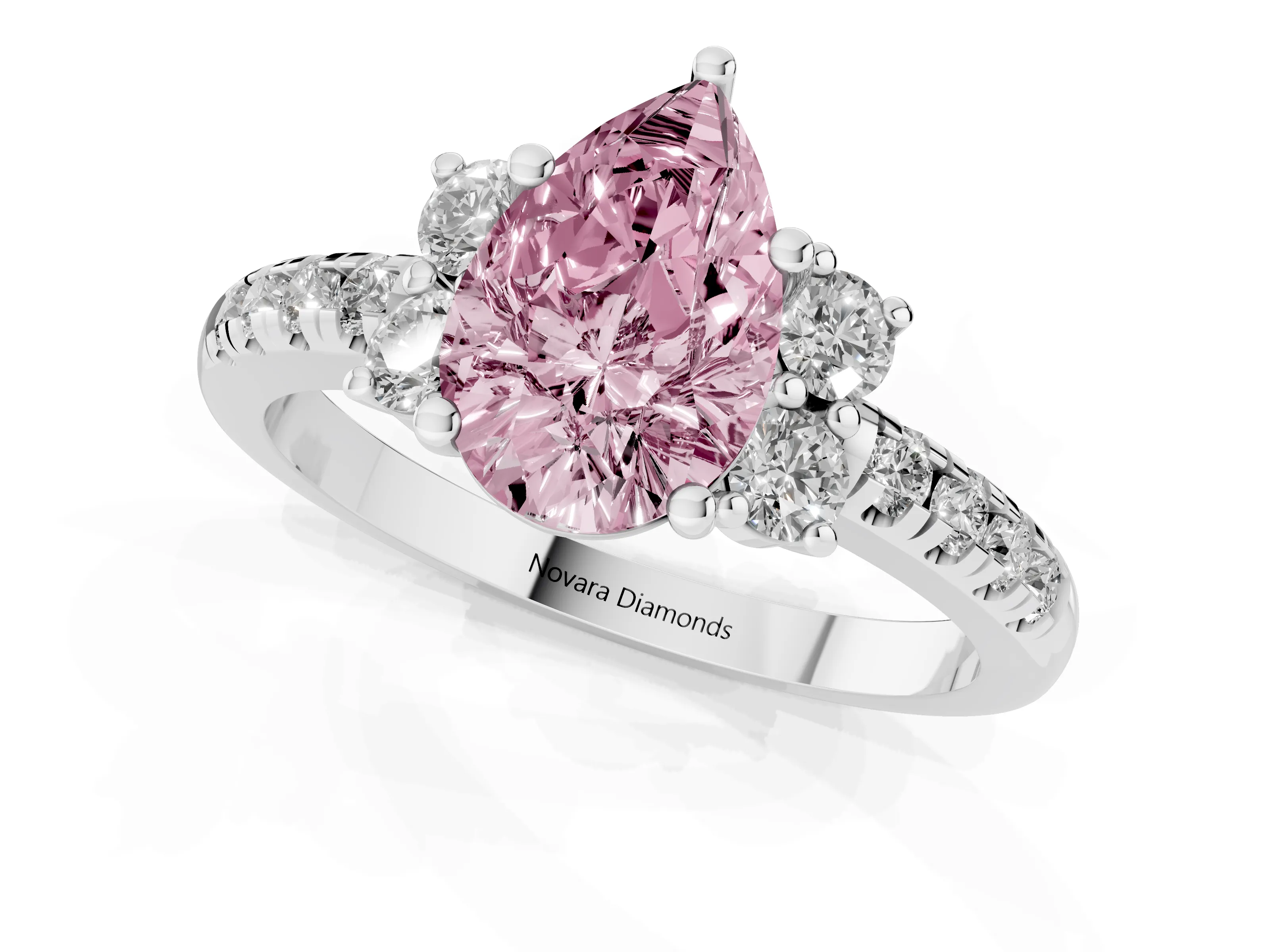 Fancy Pink Pear Cut Diamond Three-Stone Pavé Ring Set in Platinum with Prong Setting