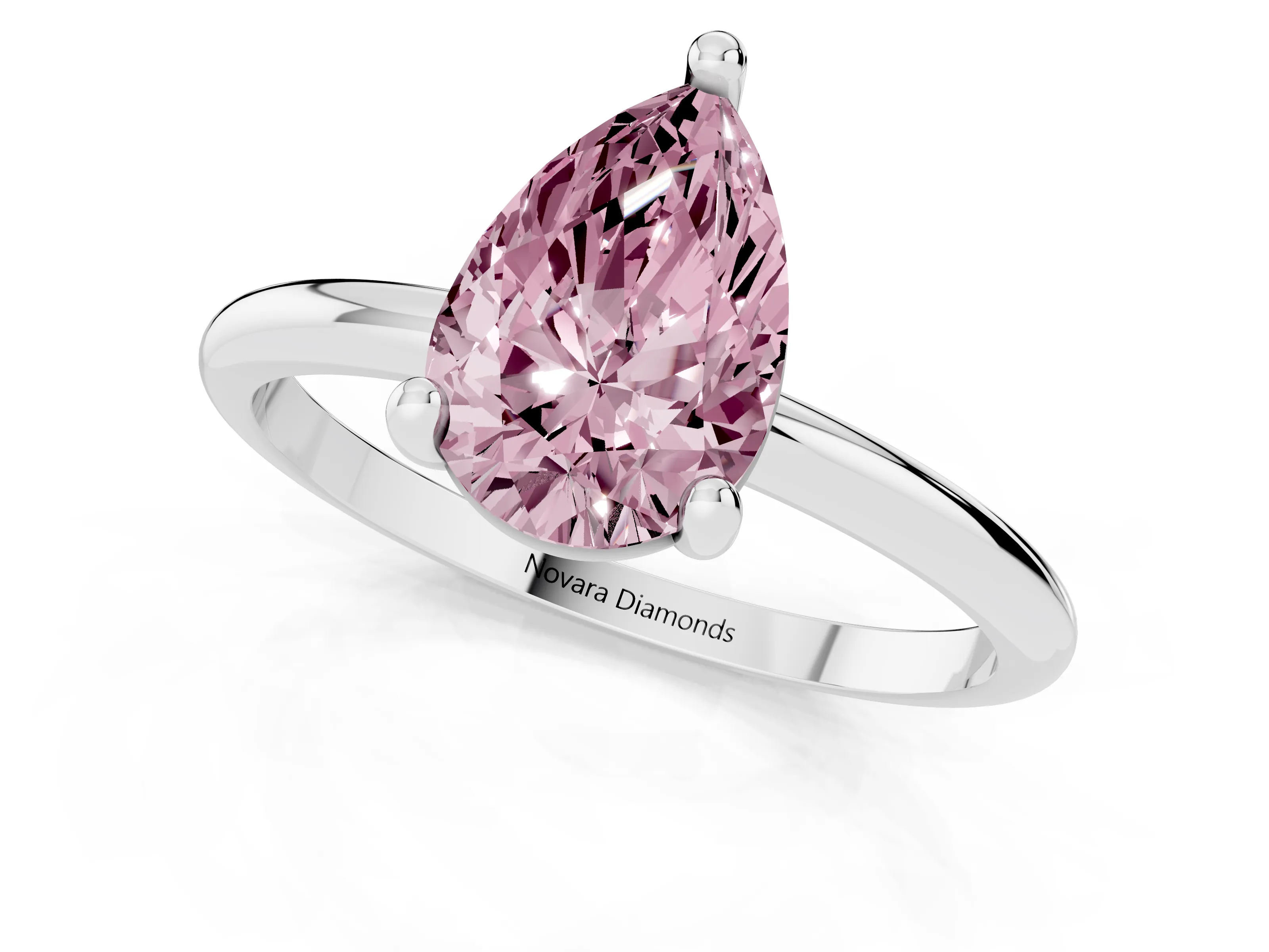 Fancy Pink Pear Cut Diamond Solitaire Ring Set in White gold with Secure Prong Setting on a Classic Band