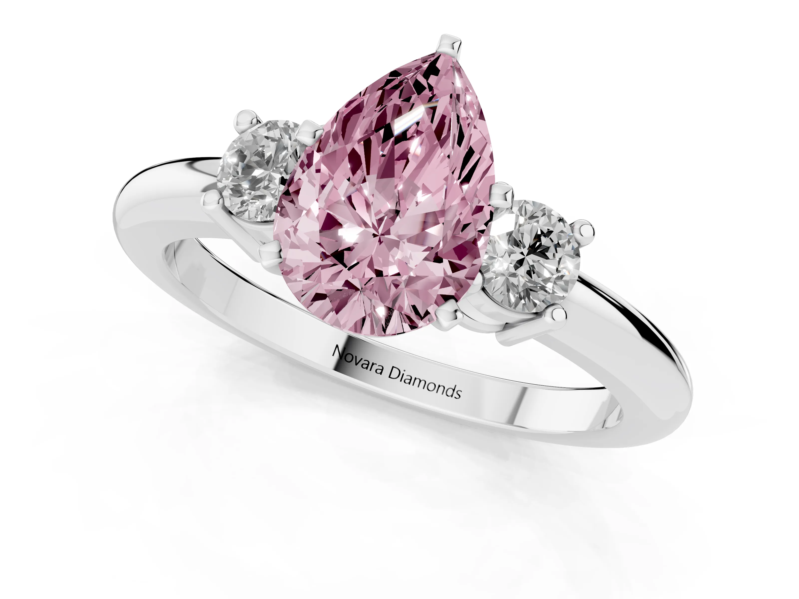 Fancy Pink Three-Stone Pear Cut Diamond Ring Set in Silver with Prong Setting and Plain Band