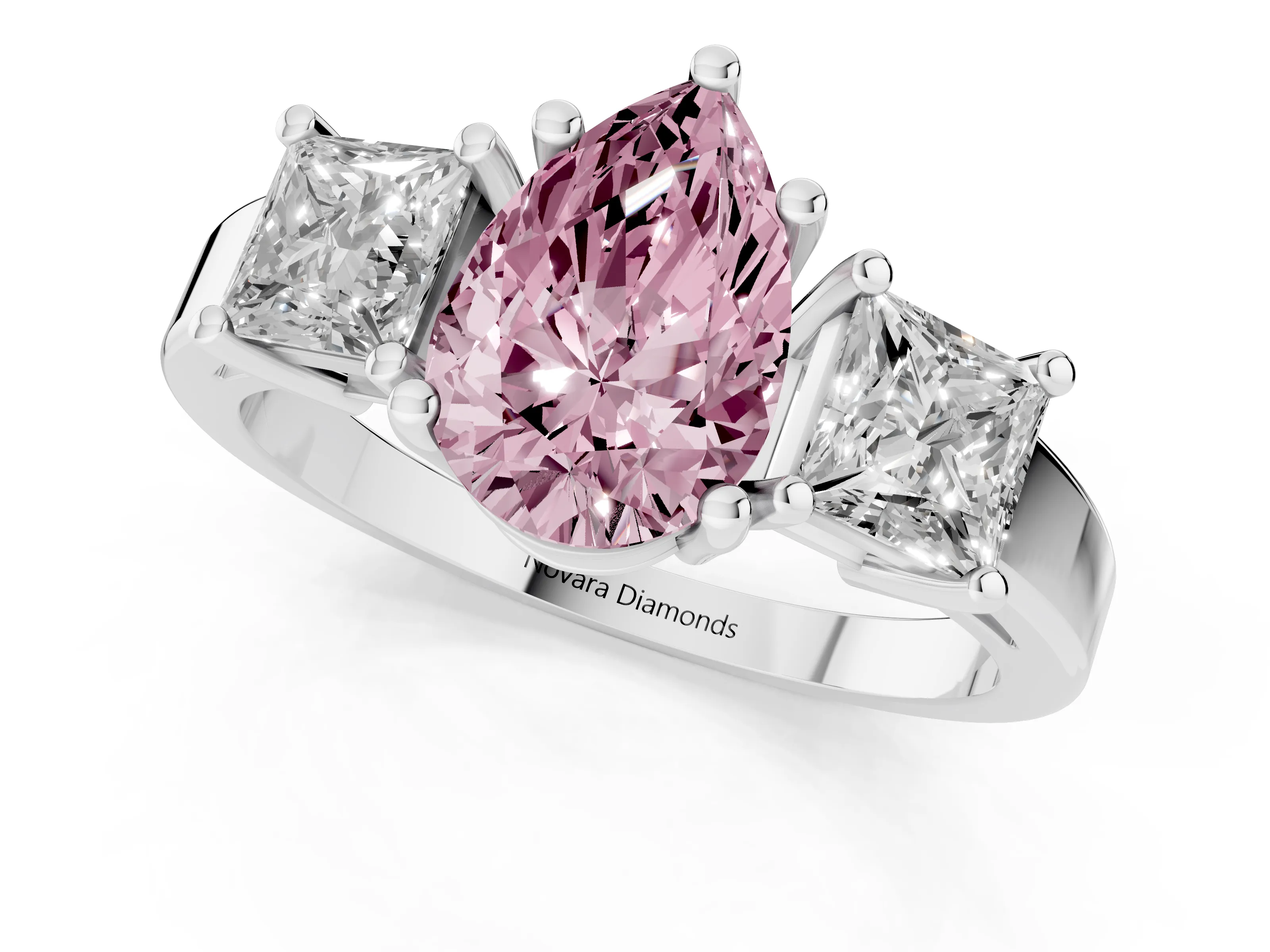 Fancy Pink Three-Stone Pear Cut Diamond Solitaire Ring Set in Platinum with Prong Setting