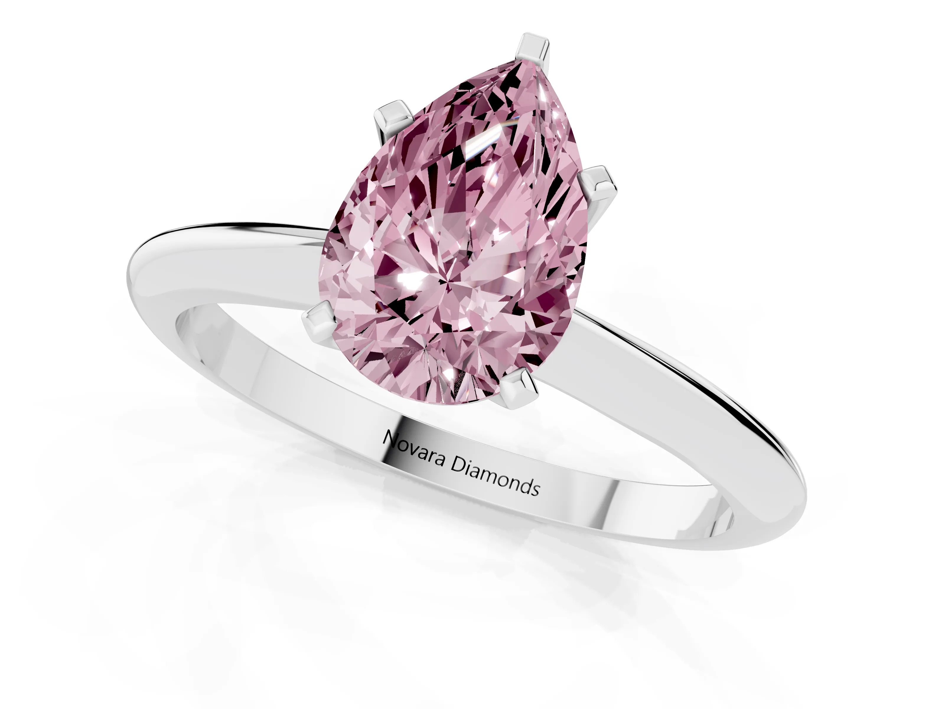Fancy Pink Pear Cut Diamond Solitaire Ring Set in Silver with Prong Setting on a Plain Round Band