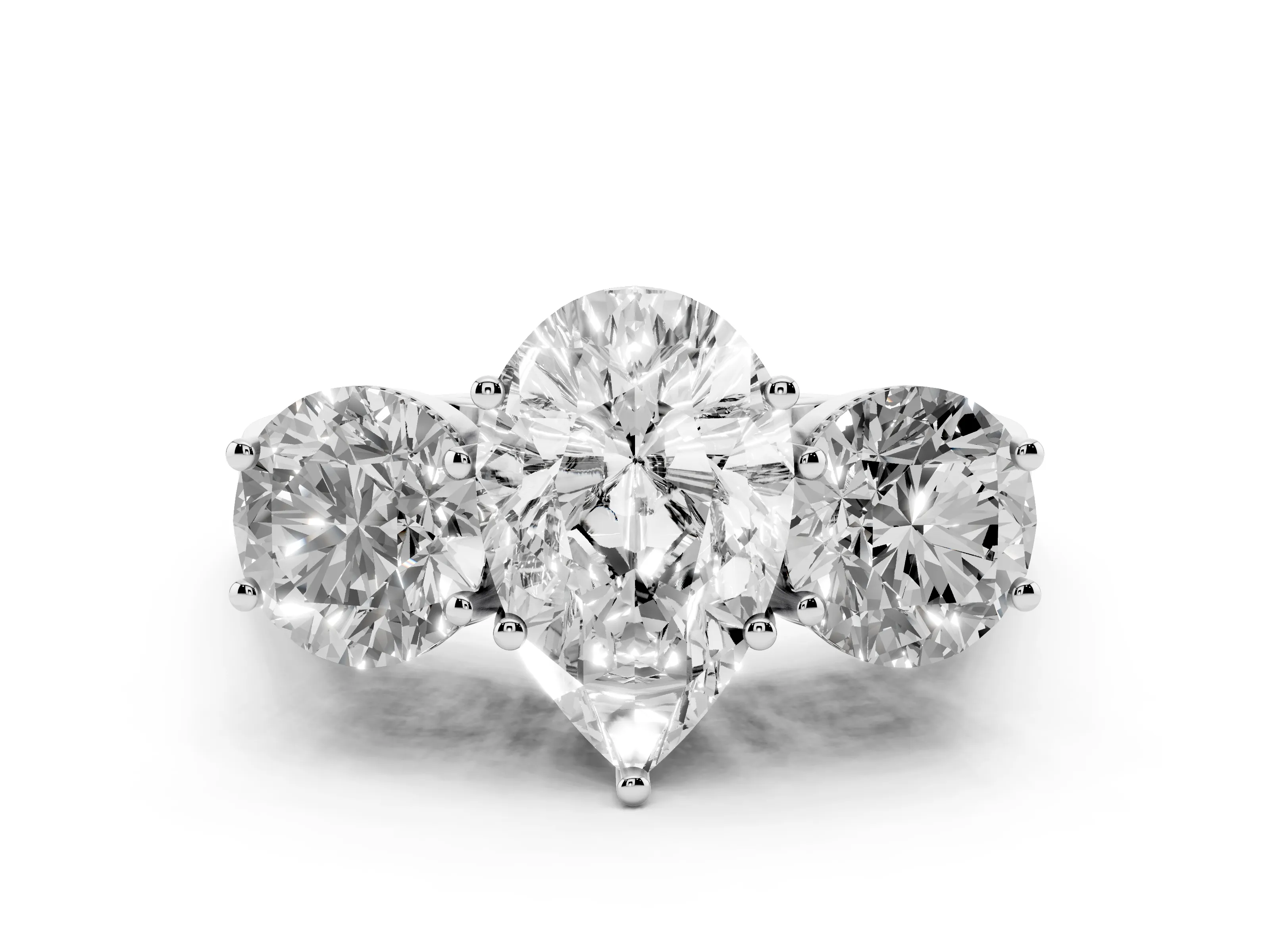Pear Cut Diamond Three-Stone Engagement Ring Set in Silver with Polished Band