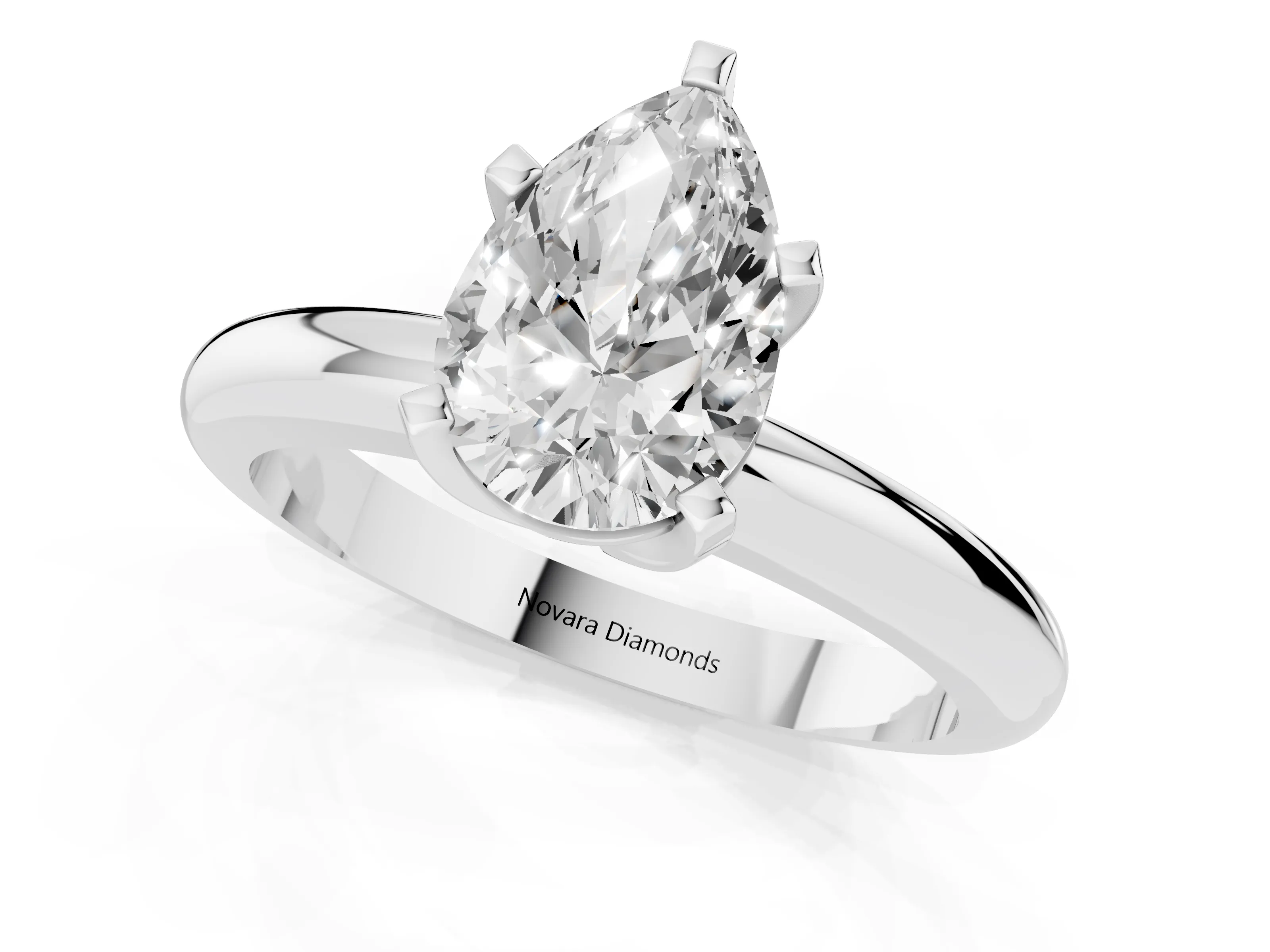 Pear Cut Diamond Solitaire Engagement Ring Set in White gold with Round Band and Prong Setting