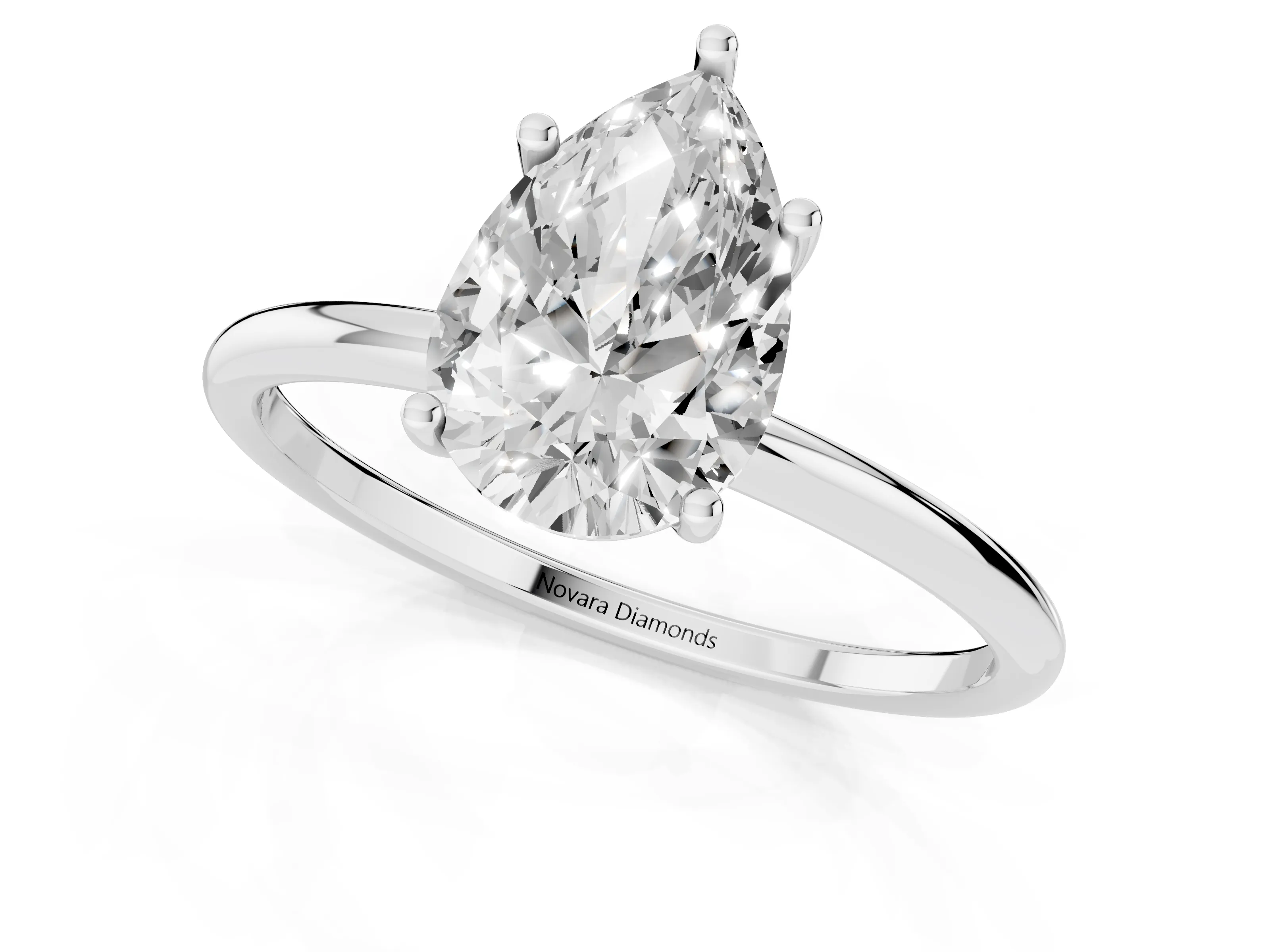 Pear Cut Diamond Solitaire Engagement Ring Set in Platinum with Thin Band and Prong Setting – second view