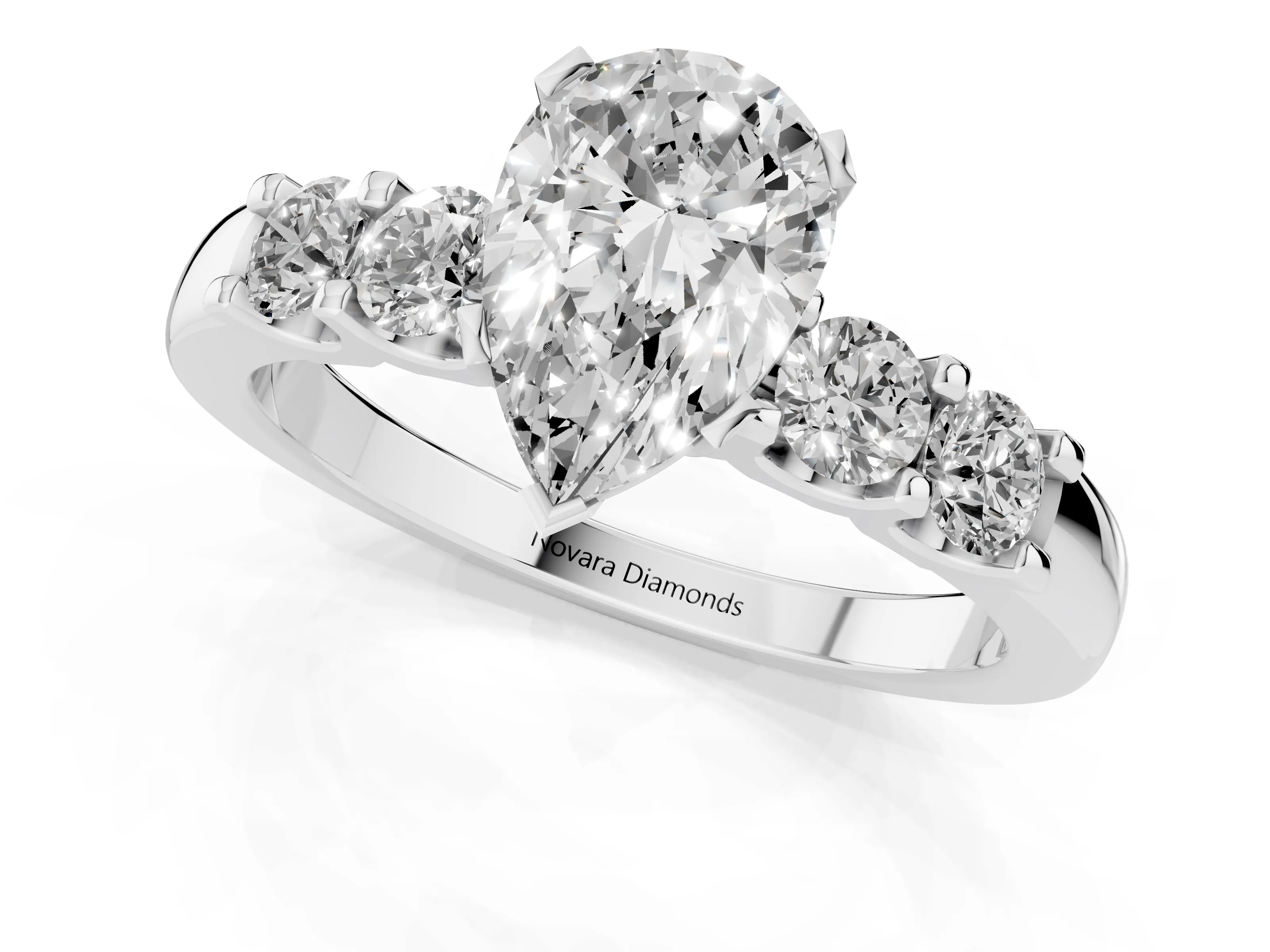 Pear Cut Diamond Five-Stone Prong Set Engagement Ring Set in Platinum with Channel Band