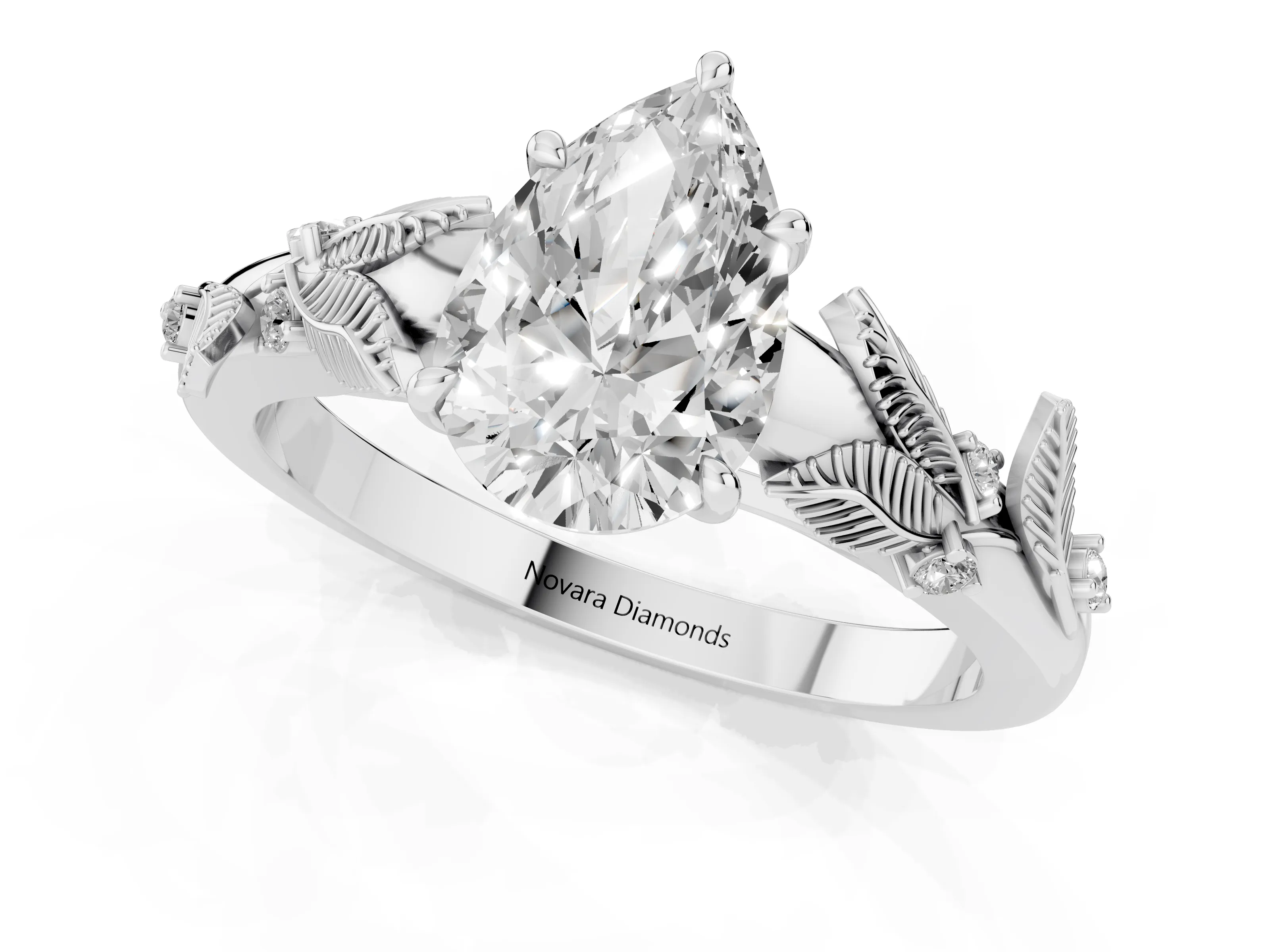 Pear Cut Diamond Solitaire Ring Set in White gold with Leaf Motif Band